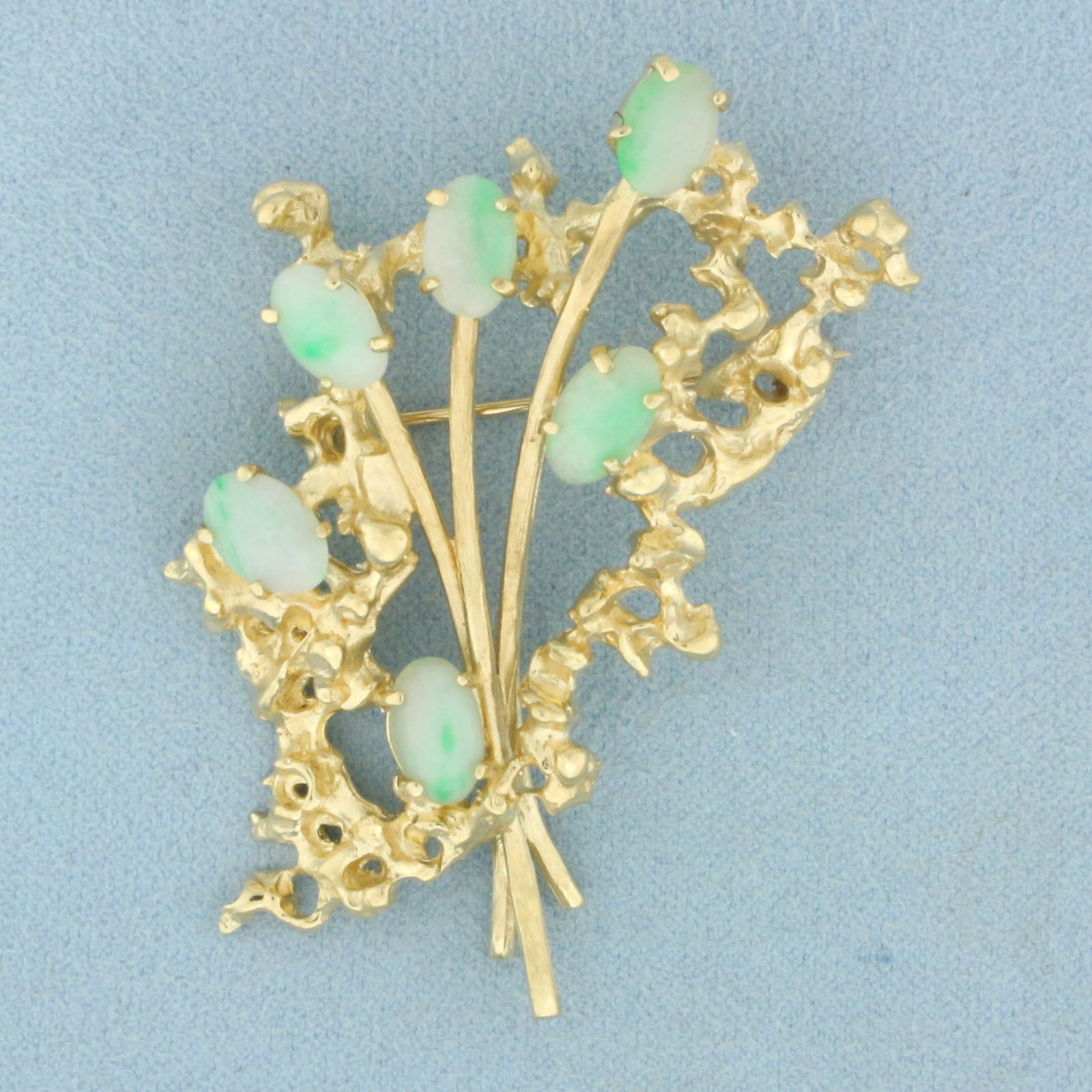 Jade Flower Bouquet Brooch in 14k Yellow Gold: In 14k Yellow Gold. Contains six 8mm high quality natural Jade gemstones. 2 inches long. 1 3/4 inch wide. 18.7g.