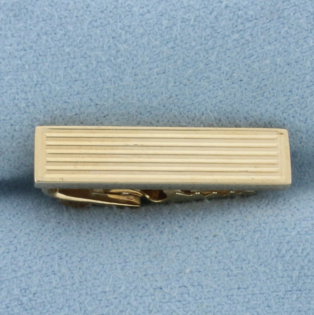 Vintage Tie Clip in 10k Yellow Gold: In 10k yellow gold. 7/8 inches long and 1/4 inch wide. 2.7g.