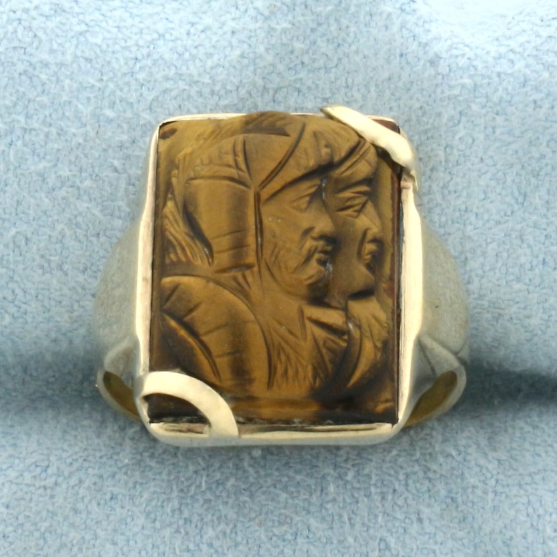Carved Spartan Soldier Tiger's Eye Ring in 14k Yellow Gold: In 14k Yellow Gold. Contains one 16mmx11mm high quality carved Tiger's Eye gemstone. Size 6. 5.8g.