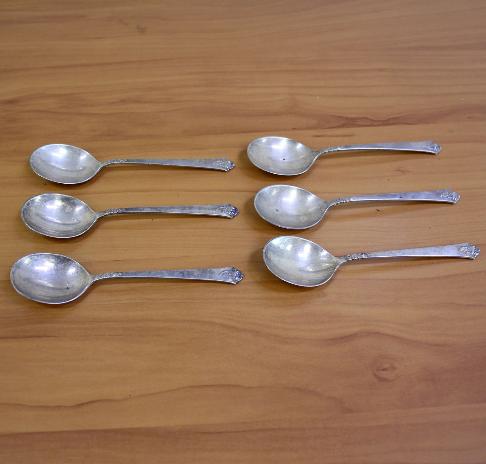 Royal Crest "Castle Rose" Sterling Silver Soup Spoons Set of 6: In .925 Sterling Silver. Contains six round bowl cream soup spoons - 6 1/4 inches. 202.0g.