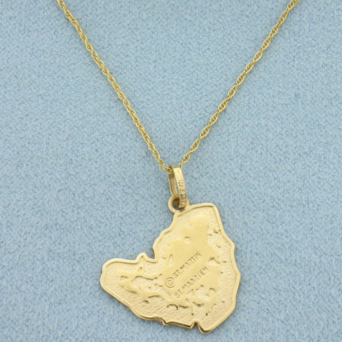 Vintage St. Martin St. Maarten Map Necklace in 14k Yellow Gold: In 14k Yellow Gold. Pendant is 7/8 inch long by 3/4 inch wide. Chain is 16 inches long by .8mm wide. 2.6g.