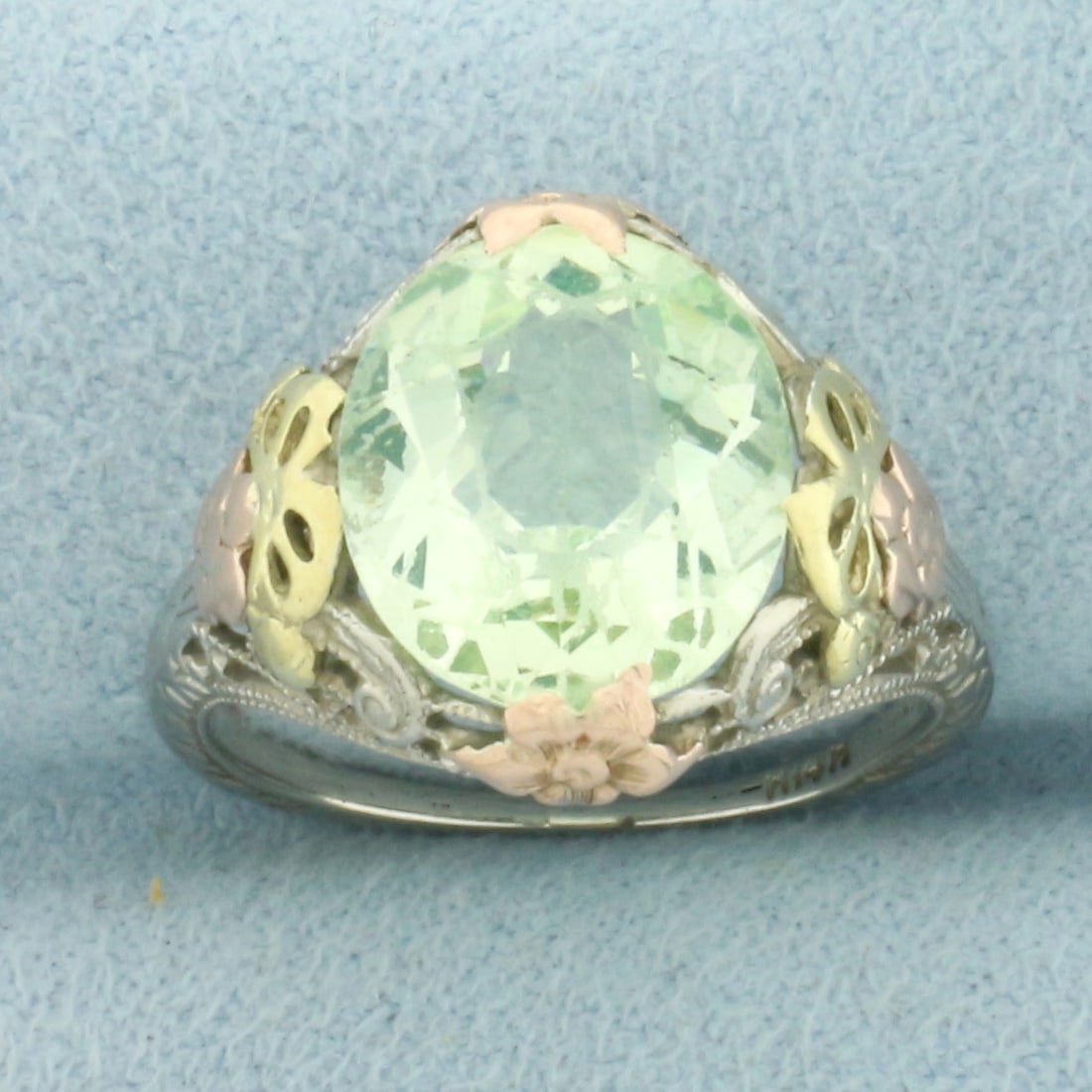 Vintage Mint Green Tourmaline Filigree Ring in 14k White, Rose, and Green Gold: In 14k white, rose, & green gold. 14mm wide at center. Contains one high quality natural Tourmaline gemstone, 13x10mm, approximately 4ct, with intense mint green color and excellent clarity. Some mino