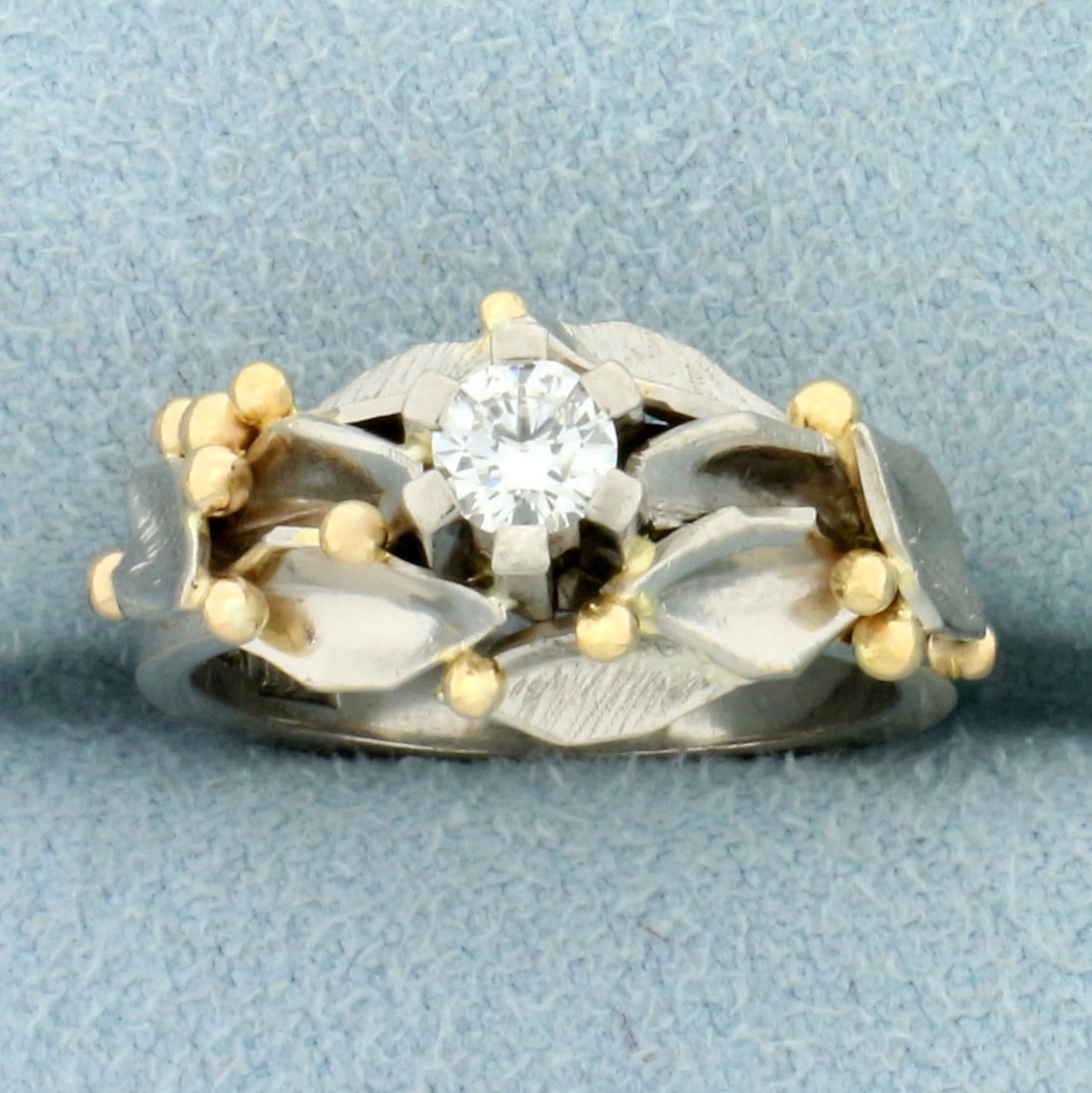 Designer Cla?s Giertta Modernist Diamond Ring in 18K White and Yellow Gold: In 18K White and Yellow Gold. Contains one high quality .19ct round brilliant Diamond, VS clarity/G color. Designed by Cla?s Giertta of Stockholm, Sweden. Size 4. 6.6g.