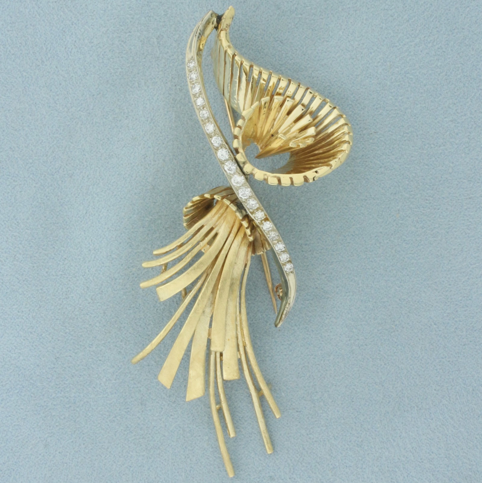 Diamond Tassel and Spiral Design Brooch in 14k Yellow Gold: In 14k yellow gold. Contains 18 high quality diamonds, 1/2ct TW, VS clarity/G color. 3 3/8 inches long x 1 3/8 inches wide.