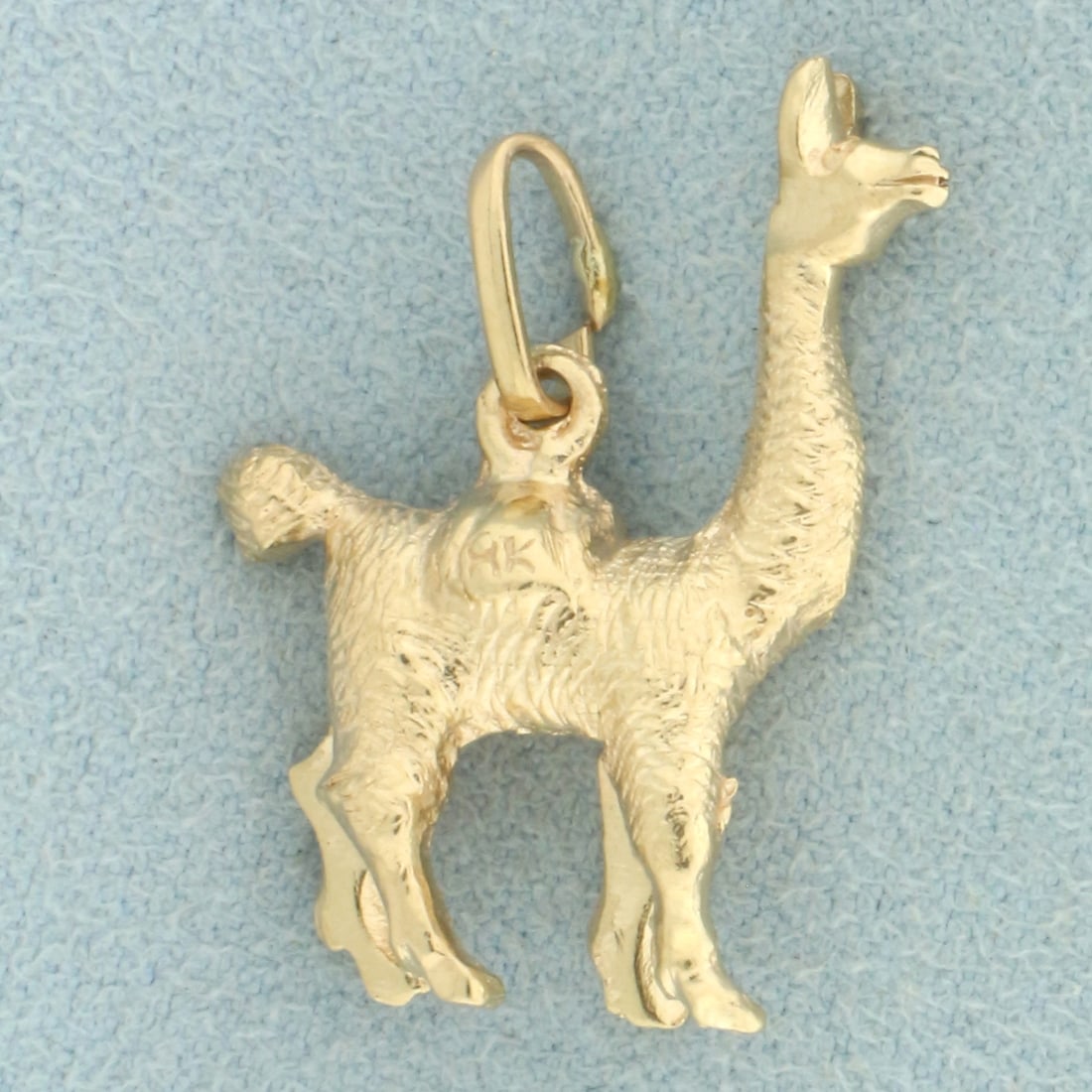 Llama or Alpaca Pendant or Charm in 18k Yellow Gold: In 18k yellow gold. 1 inch long and 3/4 inches wide. 3-D. 6.4g.