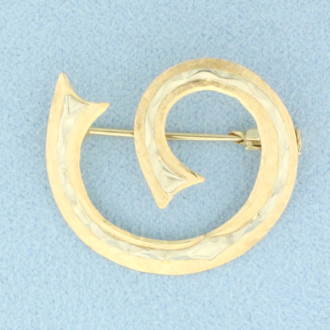 Vintage Italian Diamond Cut Swirl Design Brooch Pin in 18k Yellow and White Gold: In 18k yellow and white gold. Italian made. 1 inch long and 7/8 inch wide. 1.9g.
