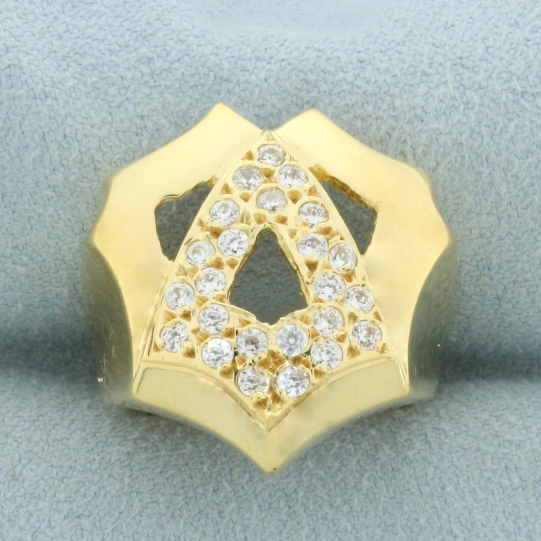 Unique Abstract Designer CZ Ring in 18k Yellow Gold: In 18k yellow gold. Size 6 1/2. 7/8 inches at widest point. Accented by high quality 2mm CZ gemstones throughout. 7.1g.