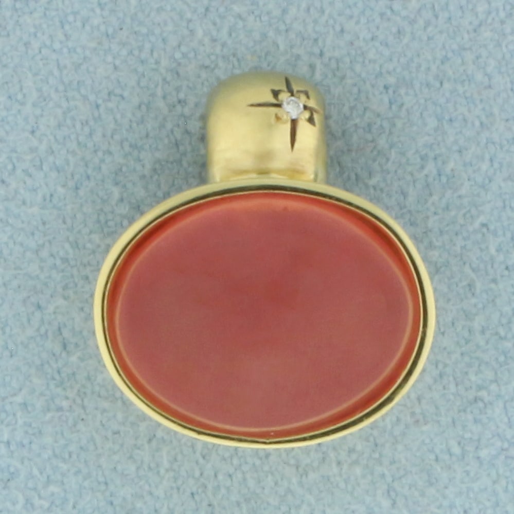 Morganite and Diamond Enhancer Pendant in 18k Yellow Gold: In 18k Yellow Gold. Contains one 14x11mm high quality oval cabochon natural Morganite gemstone, approximately 6ct, with intense salmon color and excellent clarity. Also contains one 1/2pt high quality