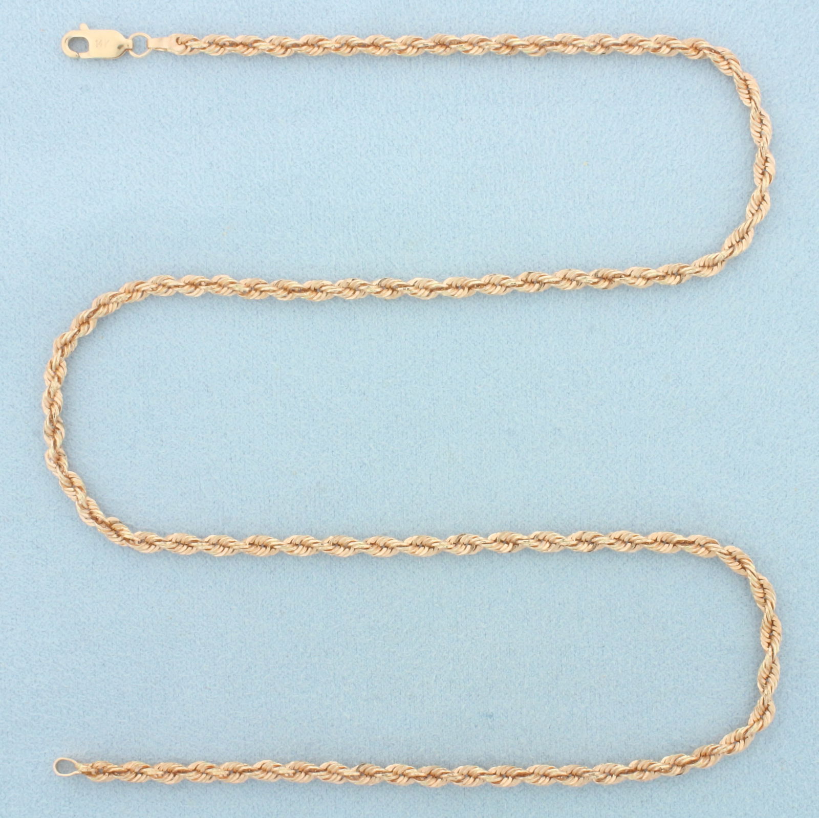 18 Inch Rope Link Chain Necklace in 14k Rose Gold: In 14k Rose Gold. 18 inches long. 3.1mm wide. Lobster clasp. 4.0g.