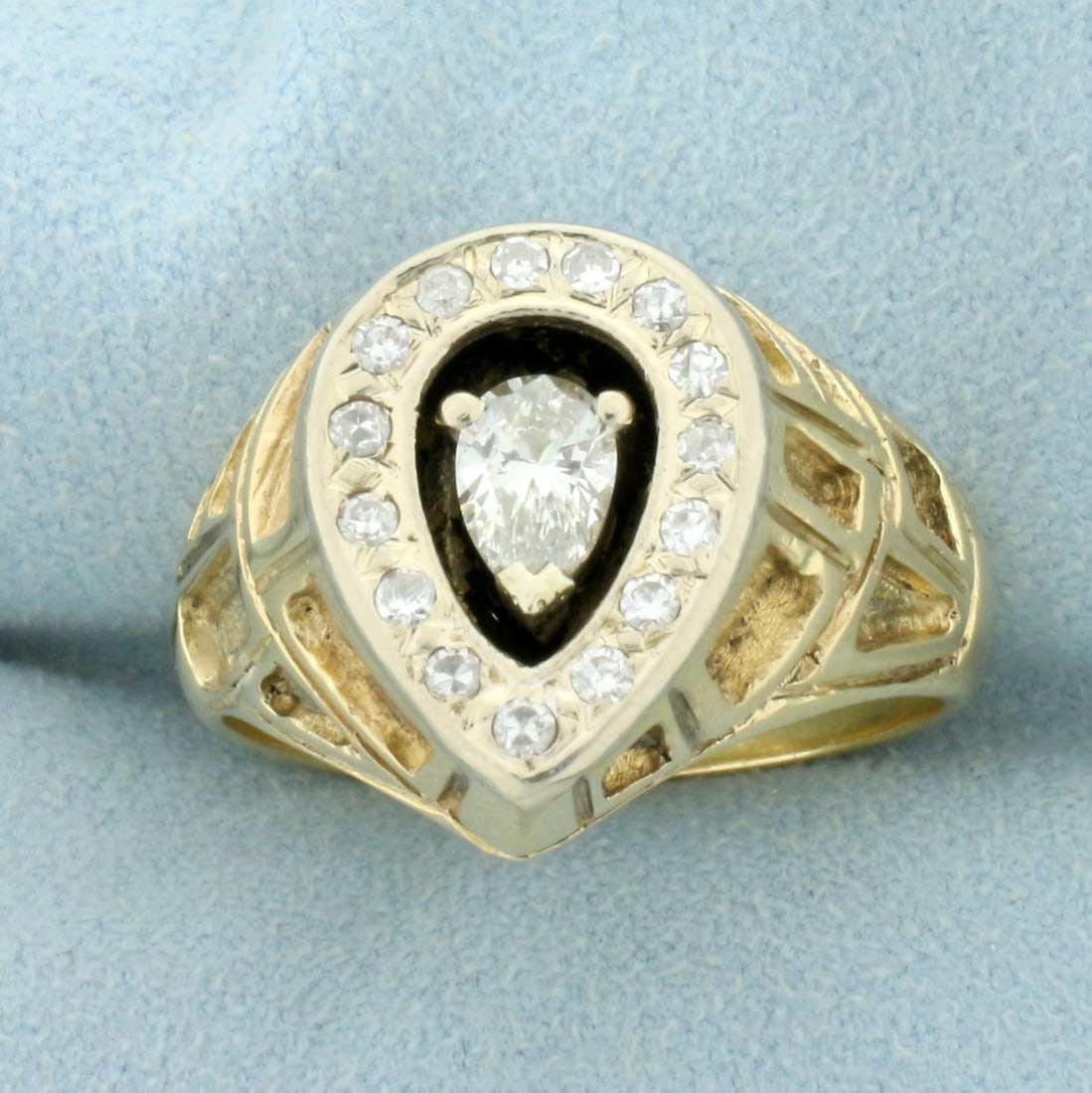 Mens Vintage Pear Diamond Ring in 14K Yellow Gold: In 14K Yellow Gold. Contains one high quality .4ct pear cut Diamond, VS clarity/I color. Also contains fifteen round Diamonds, .35ct TW, of similar high quality. Size 12. 14.6g