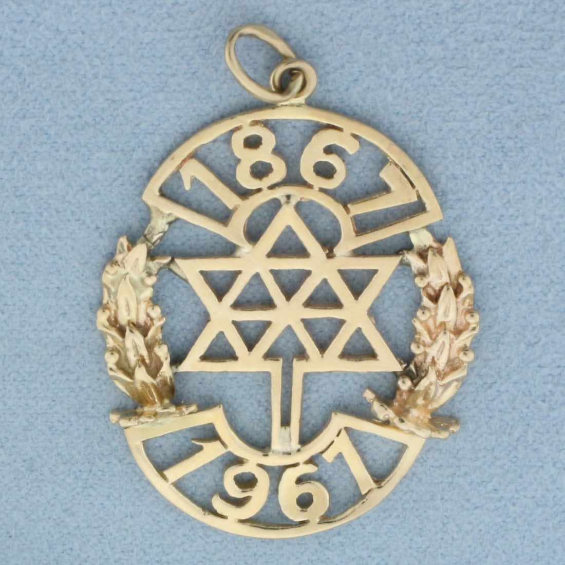 Vintage Canadian Centennial Maple Leaf Star Pendant or Charm in 14k Yellow Gold: In 14k yellow gold. 1.5 inches long (including jump ring) by 1 inch wide. 4.3g.