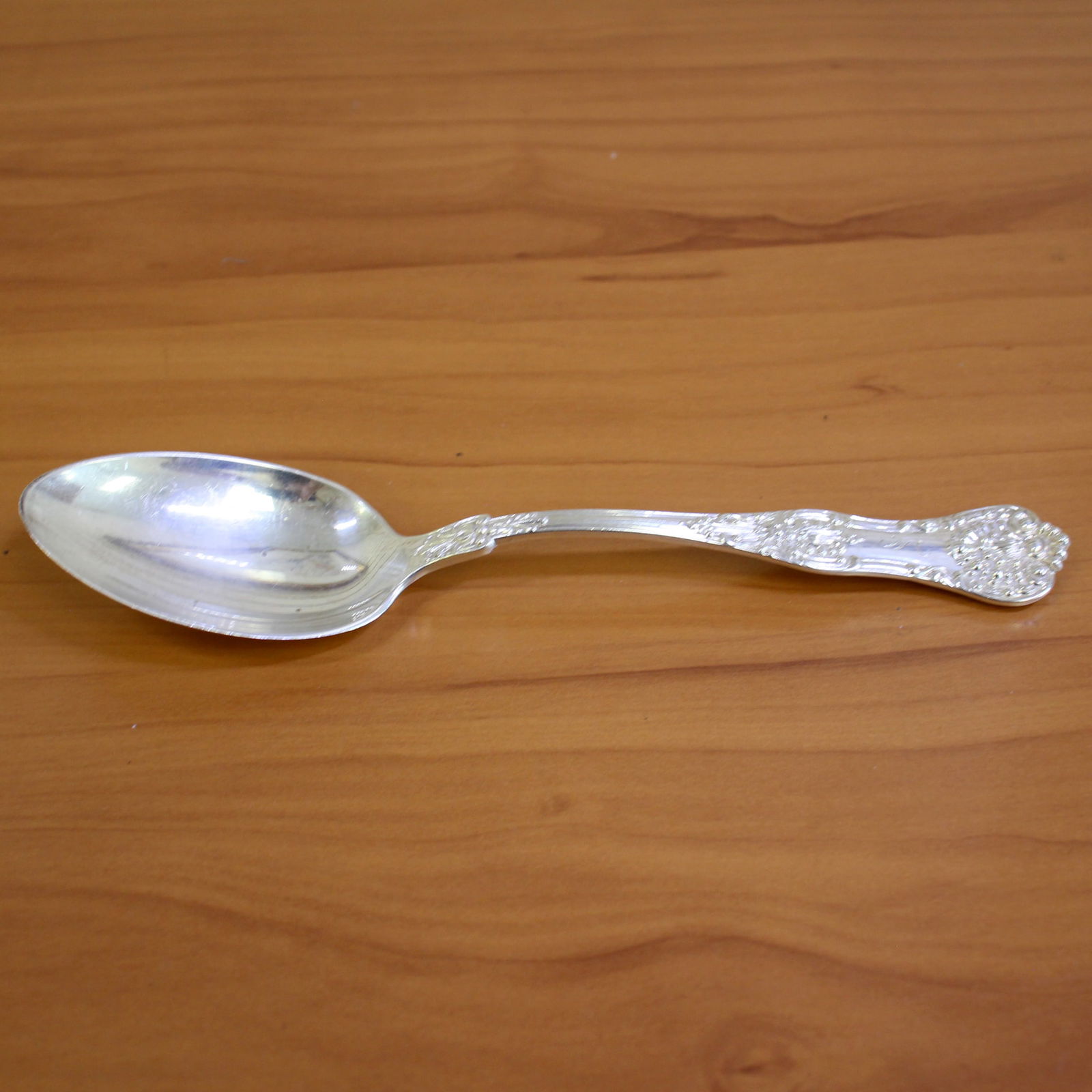Birks Silver "Queens" Sterling Silver Serving Spoon: In .925 Sterling Silver. Contains one serving spoon - 8.5 inches. Very light monogram. 92.3g.