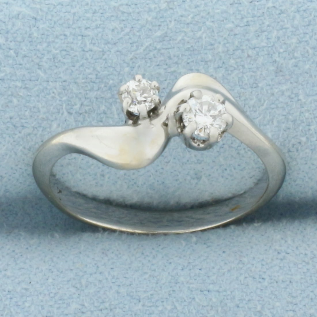 Diamond Moi et Toi Ring in 14k White Gold: In 14k White Gold. Contains one 1/5ct round brilliant and one 1/8ct Old European Cut high quality diamonds, VS clarity/H color. Size 7.5. 2.7g.