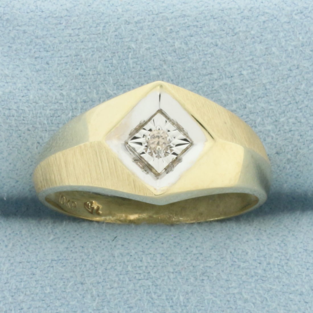 Mens Diamond Ring in 10k Yellow Gold: In 10k Yellow Gold. Contains one high quality .03ct diamond, VS clarity/I color, mirror setting makes it look like much larger 1/2ct diamond. 11mm wide at top of ring. Size 10. 3.2g.