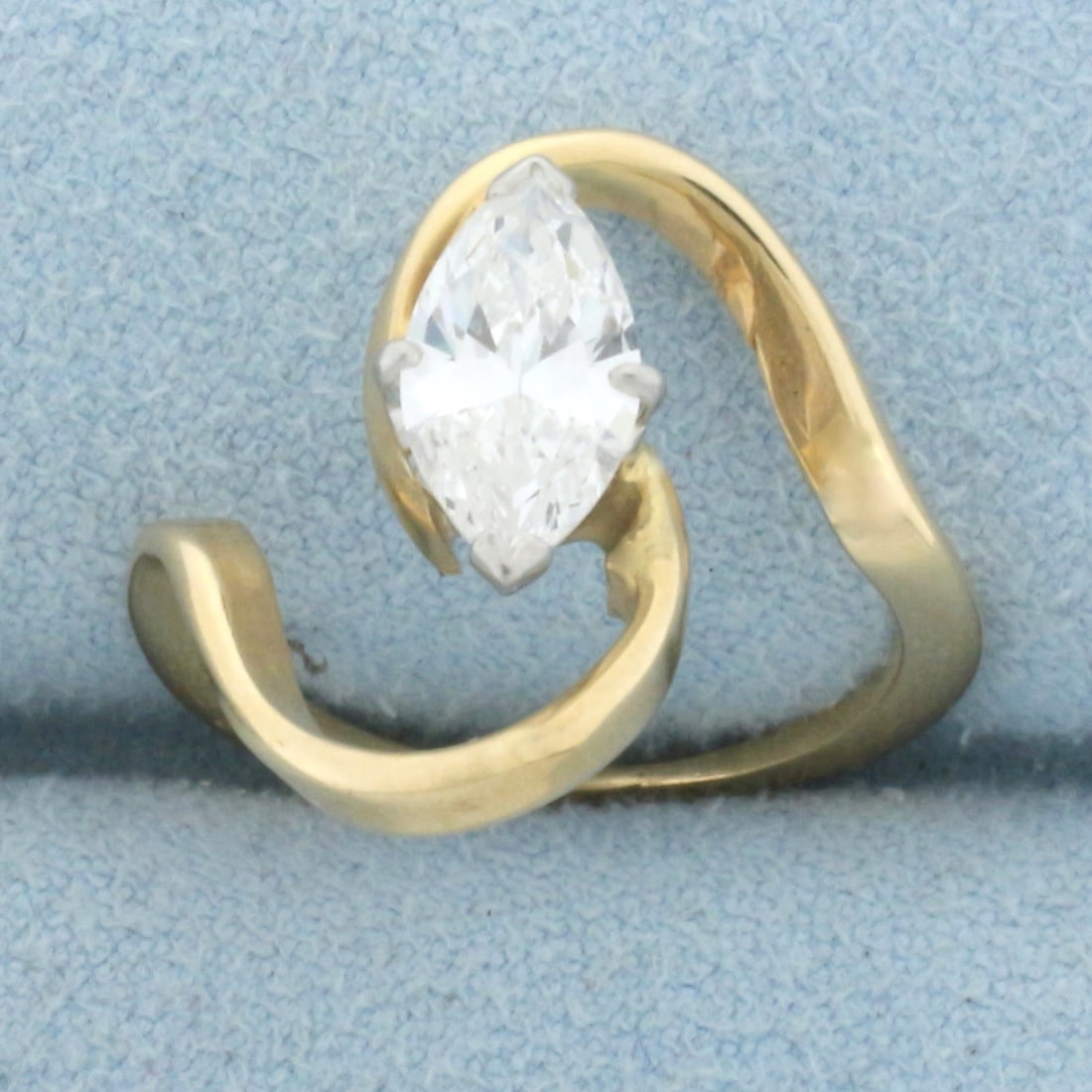 Unique Freeform Designer Marquise Diamond Engagement Ring in 14k Yellow Gold: In 14k Yellow gold. Contains one high quality 1ct marquise cut Diamond, SI clarity/G color. Size 4.5. 3.5g