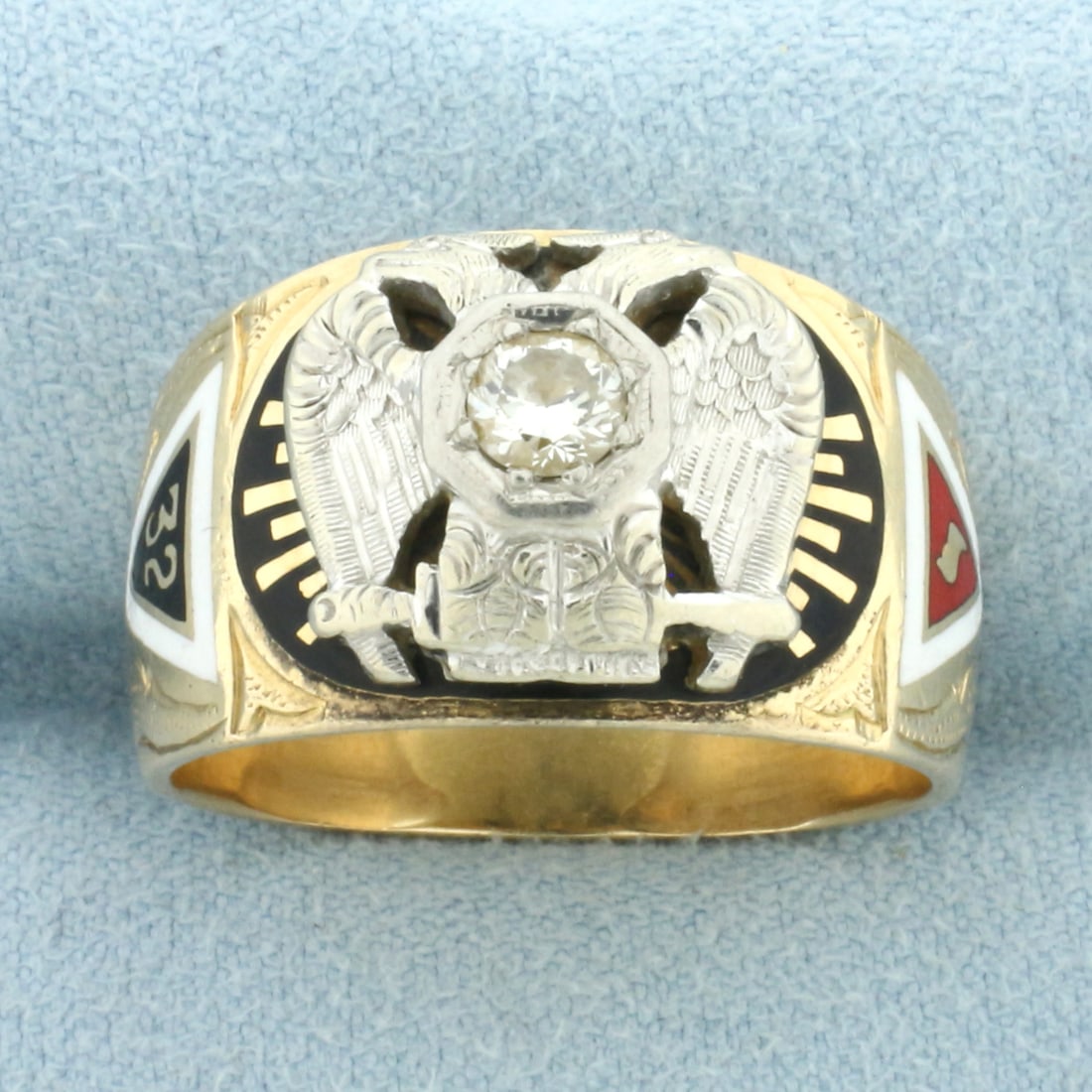 32 Degree Diamond Masonic Ring in 14k Yellow Gold: In 14k Yellow Gold. Contains one high quality 1/4ct diamond, VS clarity/H color. 14mm wide at widest point. Blue, green, red, white, and black enamel work. Size 11.25. 13.6g.