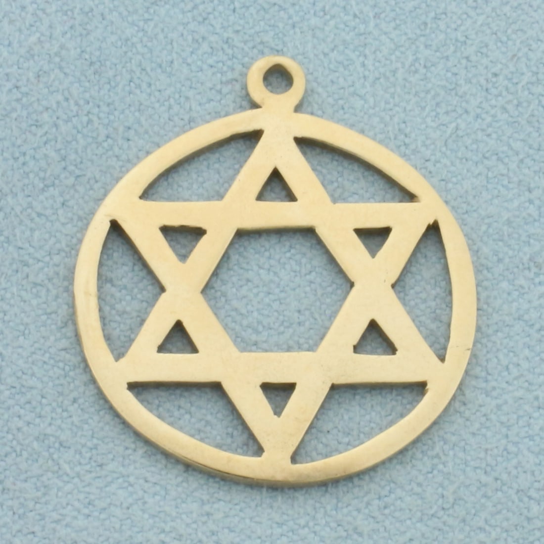 Star of David Pendant in 14k Yellow Gold: In _k Yellow Gold. 1 1/8 inch long. 3.1g.