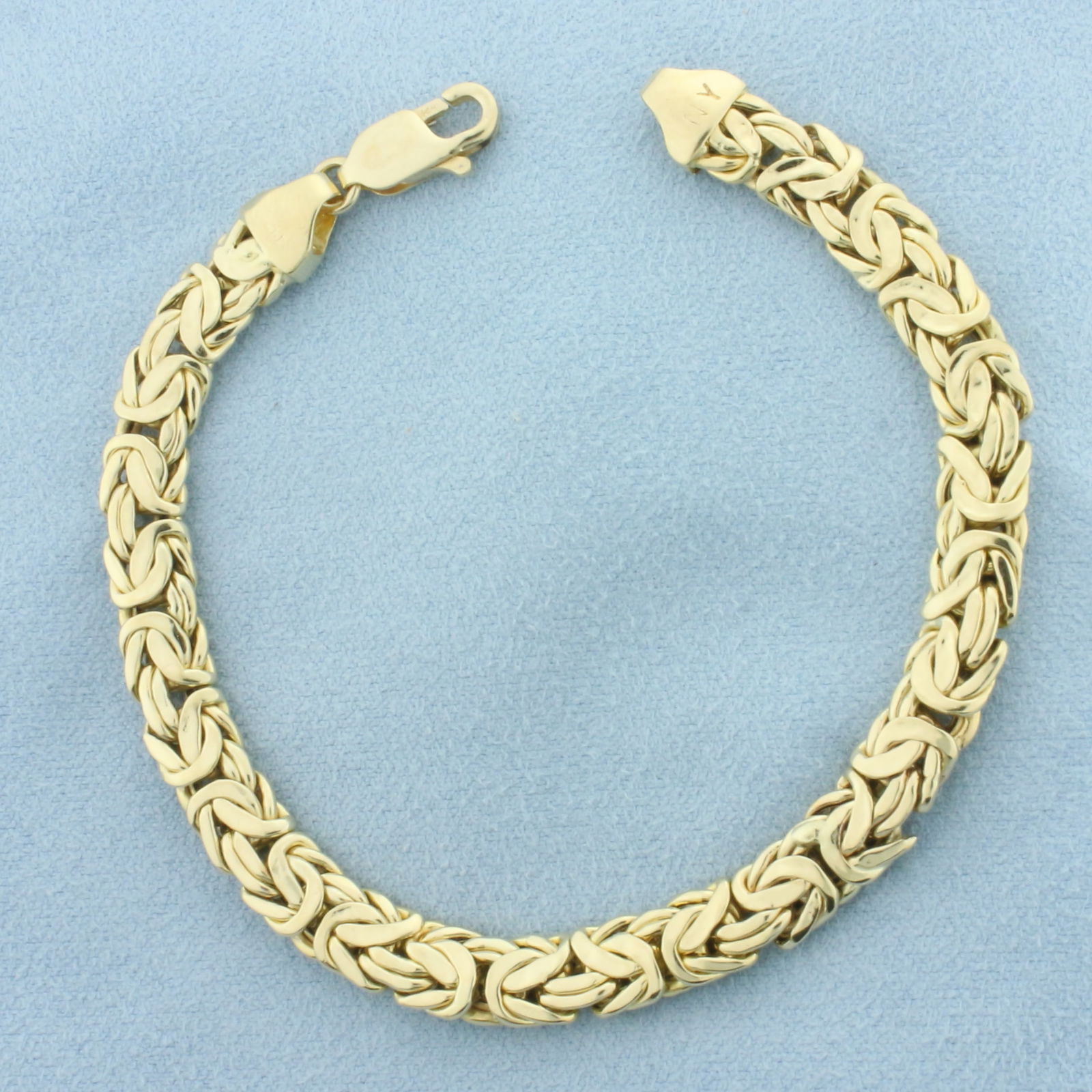 Byzantine Link Bracelet in 14k Yellow Gold: In 14k yellow gold. Measures 7.5 inch long x 0.25 inch wide. Lobster clasp. 11.5g.
