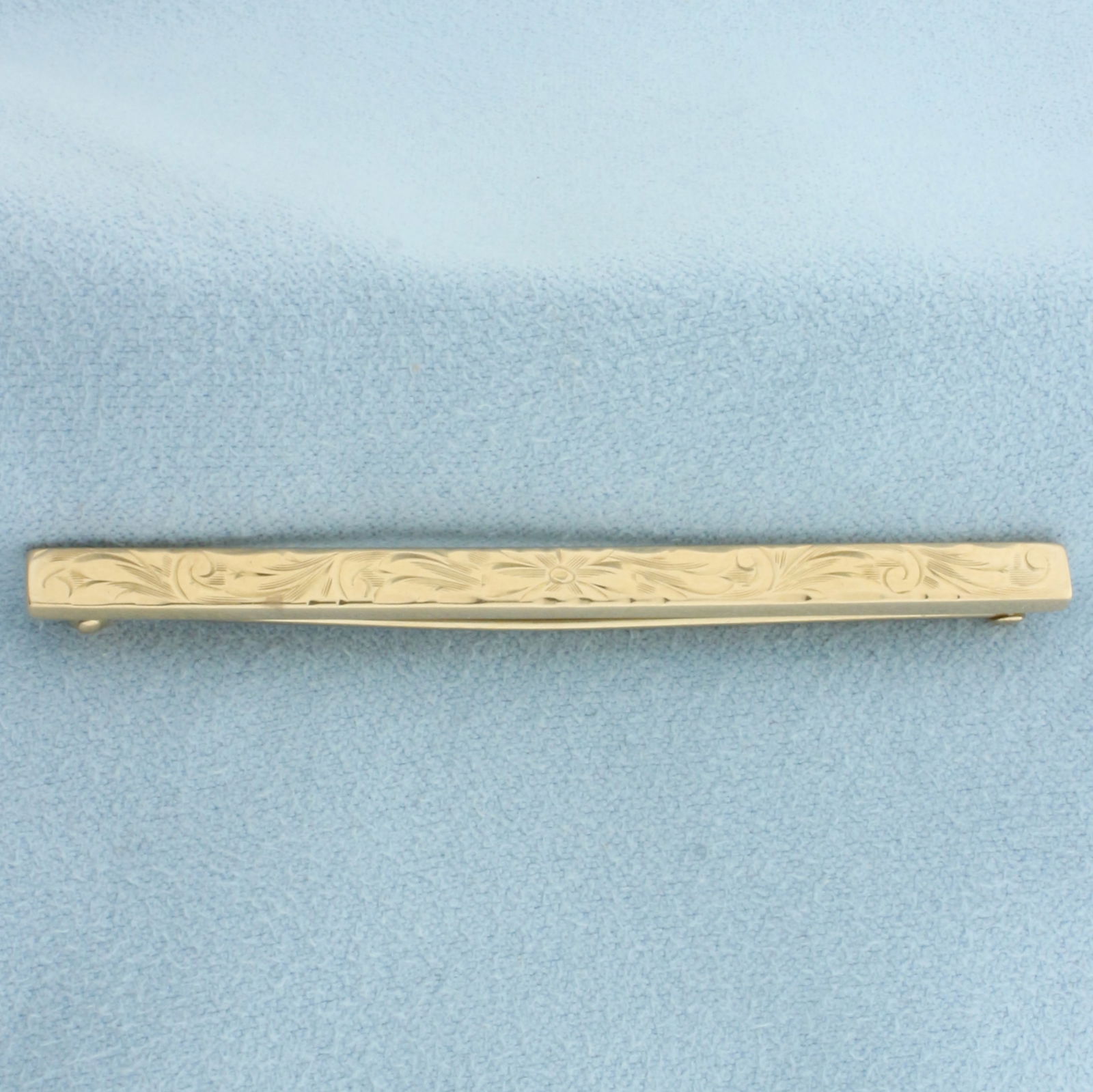 Vintage Floral Design Engraved Bar Pin in 10k Yellow Gold: In 10k Yellow Gold. 2 3/8 inches long. 4mm wide. 2.7g.