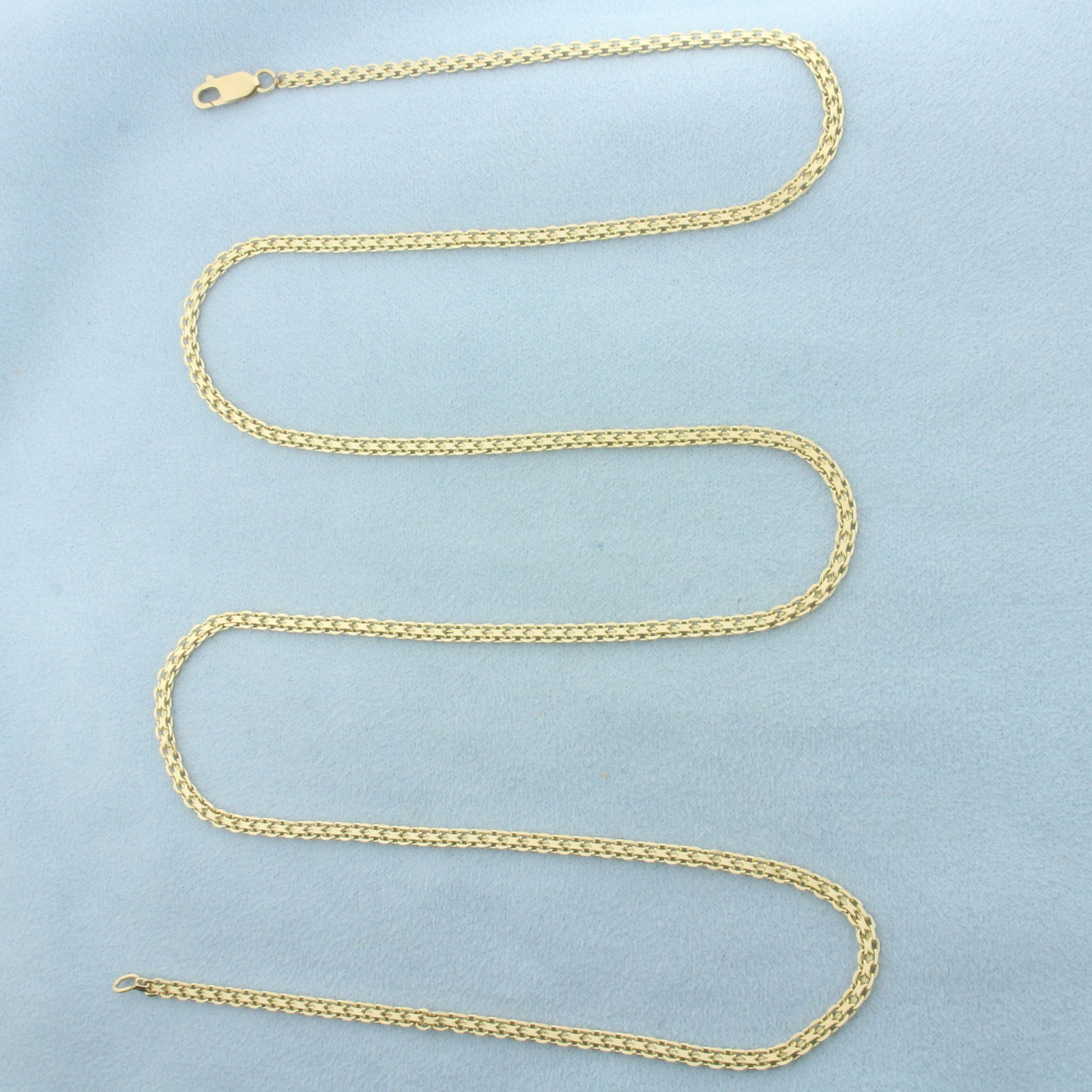 Long 29 Inch Bismark Link Chain Necklace in 14k Yellow Gold: In 14k Yellow Gold. 29 inches long. 2.7mm wide. Lobster clasp. 12.7g.