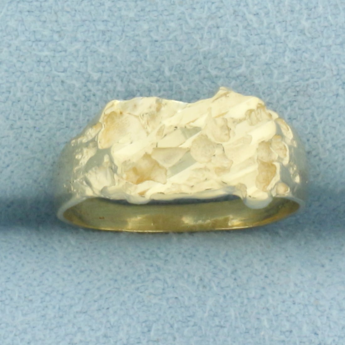 Nugget Pinky Ring in 14k Yellow Gold: In 14k Yellow Gold. 7.6mm wide at top. Size 4. 2.1g.