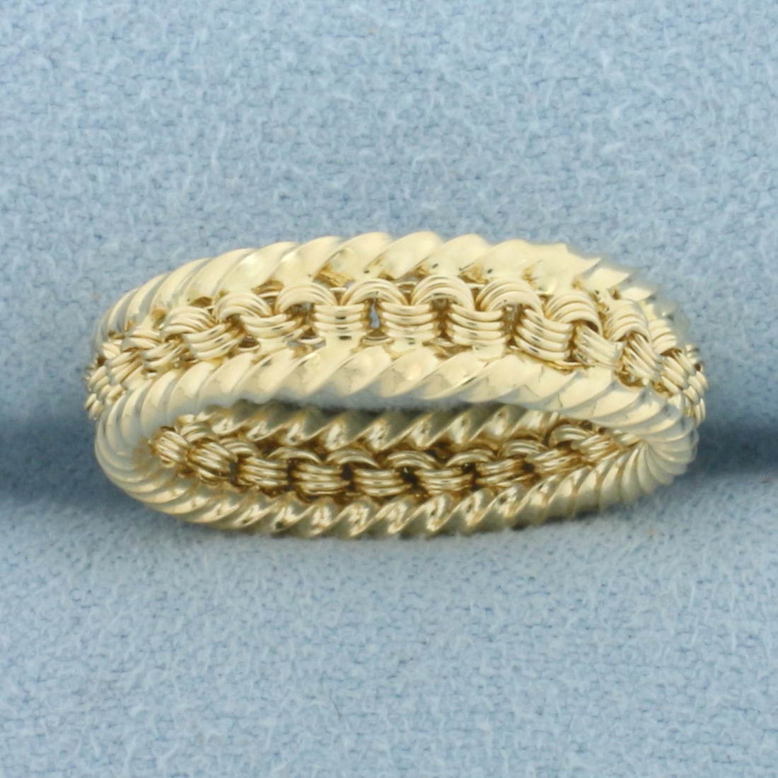 Rope Design Ring in 14k Yellow Gold: In 14k Yellow Gold. 6mm wide. Size 7. 1.3g.
