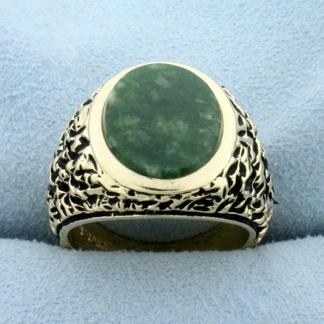 Vintage Jade Statement Ring in 14K Yellow Gold: In 14K Yellow Gold. Contains one high quality natural 14x12mm oval Jade gemstone with beautiful intense green color. Size 8. 12.1g.