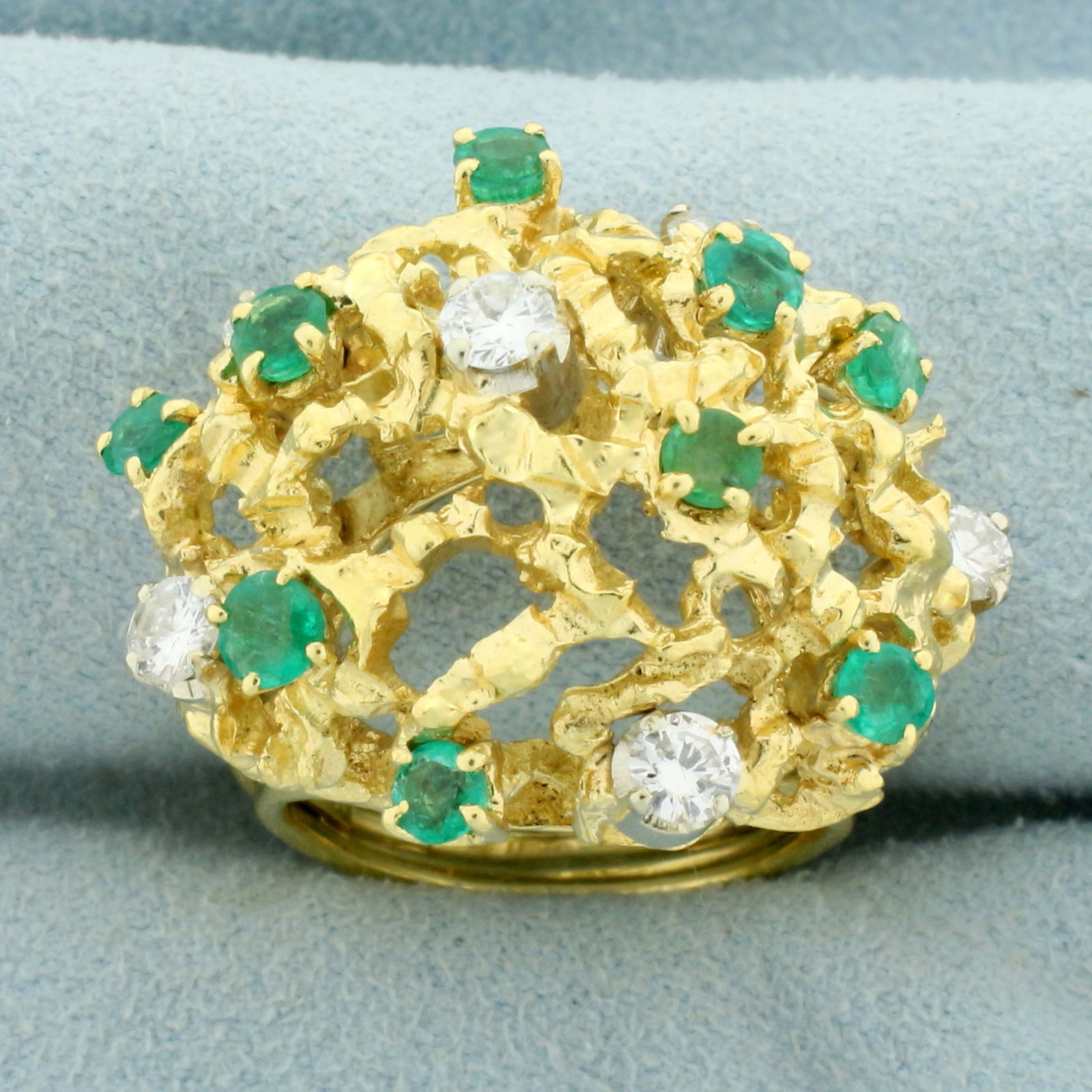 Designer Nugget Emerald and Diamond Statement Ring in 18K Yellow Gold: In 18K Yellow Gold. Contains nine high quality natural 3 to 3.5mm Emerald gemstones with vibrant green color and great clarity, 1ct TW. Also contains six high quality Diamonds, 1ct TW, VS clarity/H co