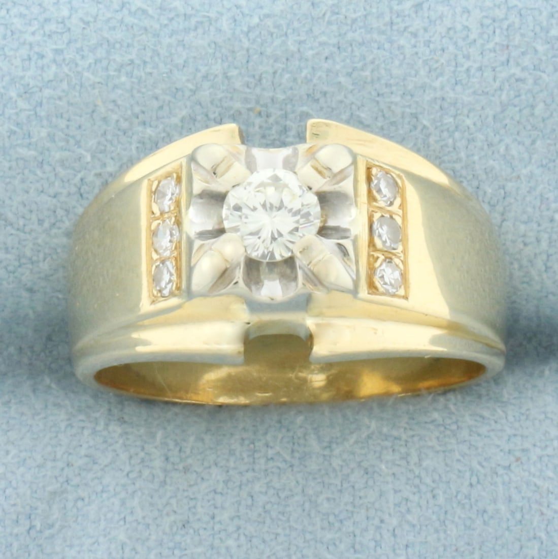 Illusion Set Diamond Engagement Ring in 14k Yellow and White Gold: In 14k yellow and white gold. Contains one round brilliant 1/3ct high quality diamond, VS clarity/H color. Illusion set to make it appear to be an over 1ct diamond. Also contains six .02ct accent diam