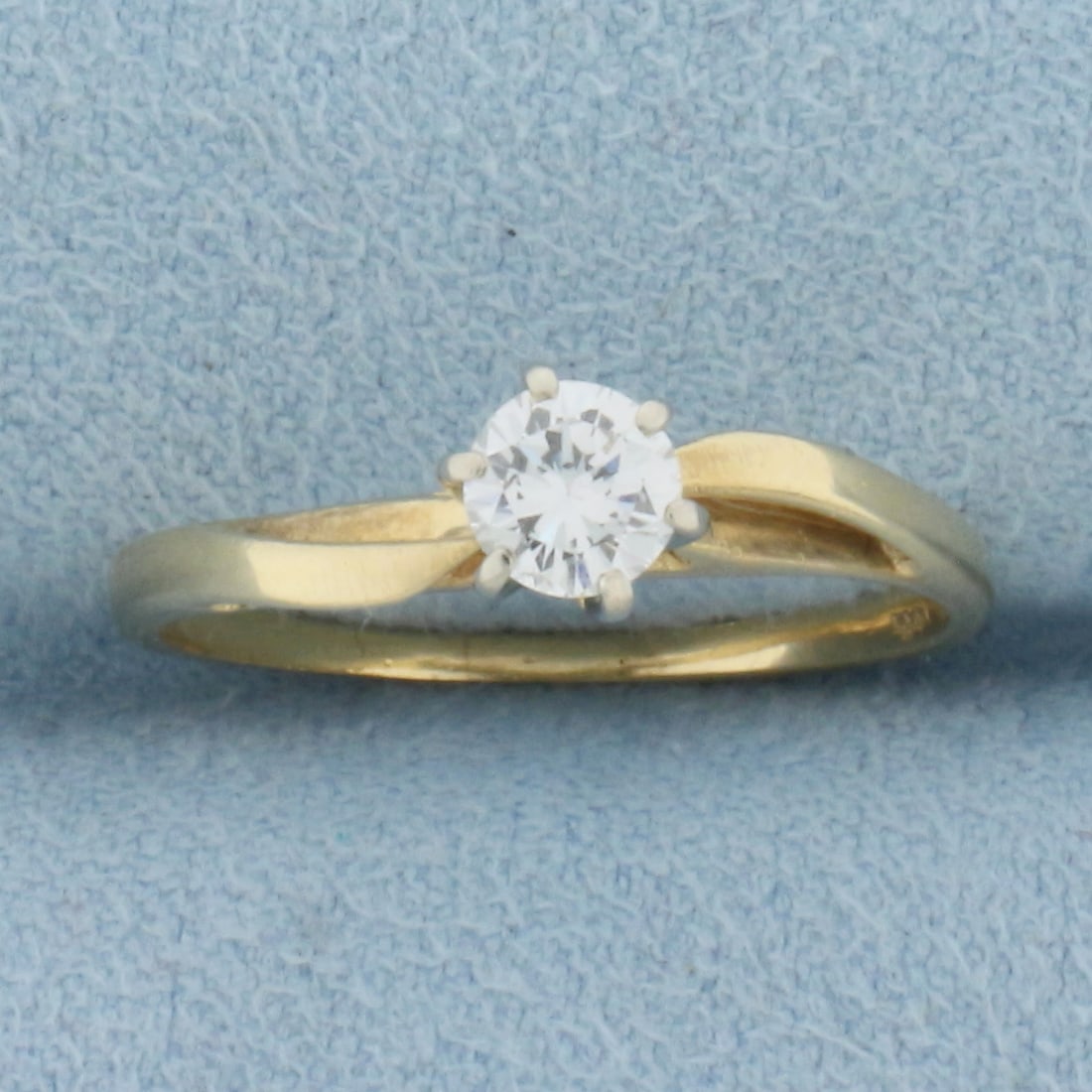 Cathedral Solitaire Diamond Engagement Ring in 14k Yellow Gold: In 14k yellow gold with white gold head. Contains one high quality .35ct round brilliant diamond,VS clarity/F color, great cut for lots of sparkle. Size 7 1/4. 2.1g.