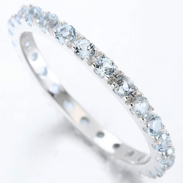Sky Blue Topaz Eternity Stacking Band Ring in Sterling Silver: In platinum over .925 sterling silver. Contains 30 genuine sky blue topaz gemstones with very light blue color, 1.3ctw. Size 7. 1.7g