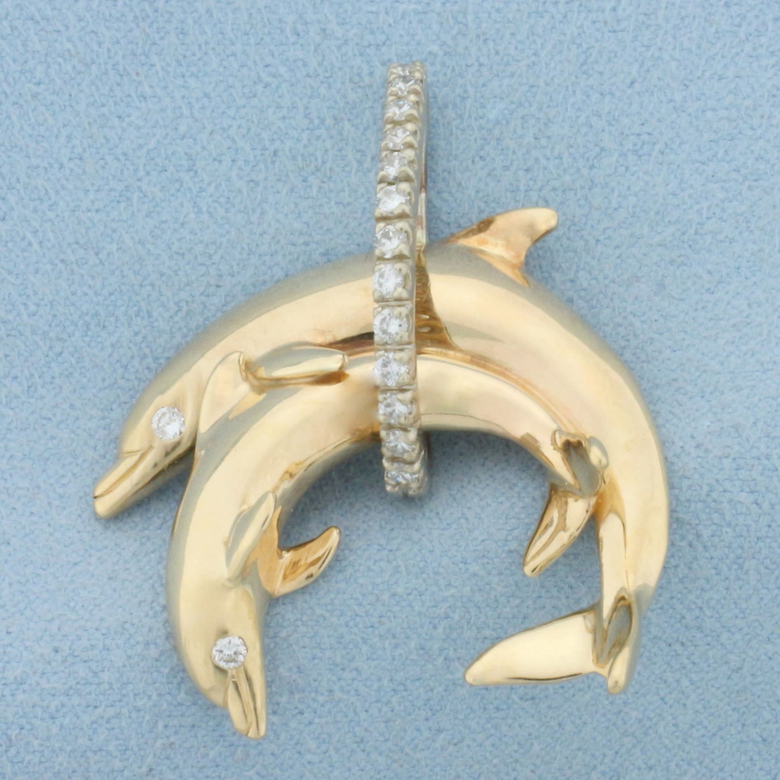 Large Diamond Dolphin Pendant in 14k Yellow Gold: In 14k Yellow Gold. Contains sixteen high quality diamonds, 1/2ct TW, VS clarity/G color. 1 5/8 inch long. 1 1/4 inch wide. 12.1g.