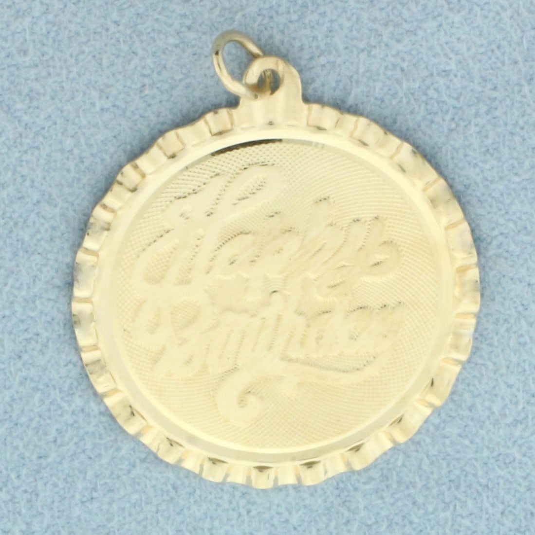 Engravable Happy Birthday Charm or Pendant in 14k Yellow Gold: In 14k Yellow Gold. 1 1/4 inches long. 1 inch wide. Blank back to engrave name and date. 2.6g.