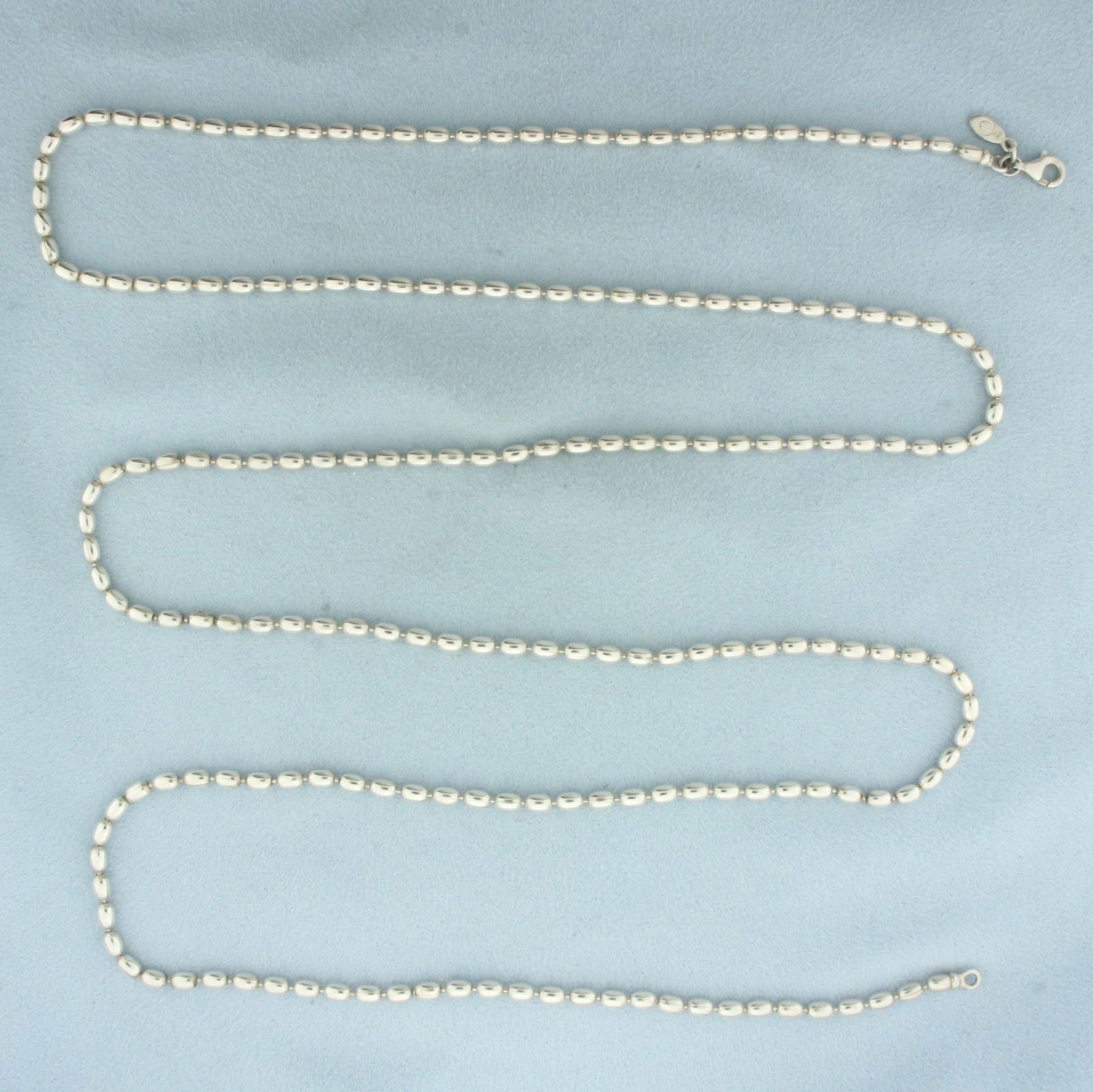 Pandora 40 Inch Oval Rice Bead Necklace in Sterling Silver: In .925 sterling silver. Guaranteed authentic. Measures 40" long, 3mm wide. Lobster clasp. 28.6g.