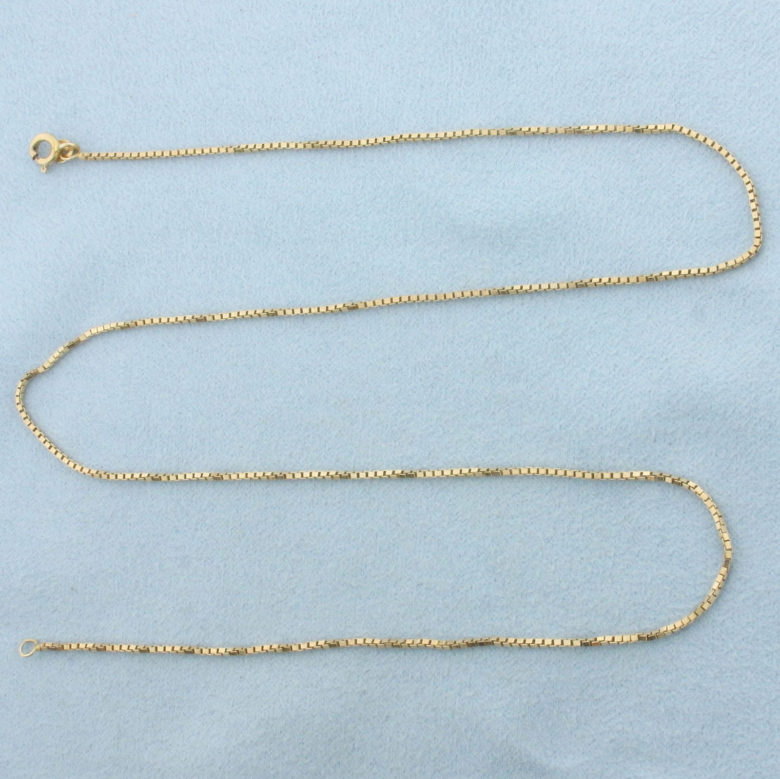 Italian 18 Inch Box Link Chain Necklace in 14k Yellow Gold: In 14k Yellow Gold. 18 inches long. 1mm wide. Box link. Made in Italy. Spring clasp. 3.2g.