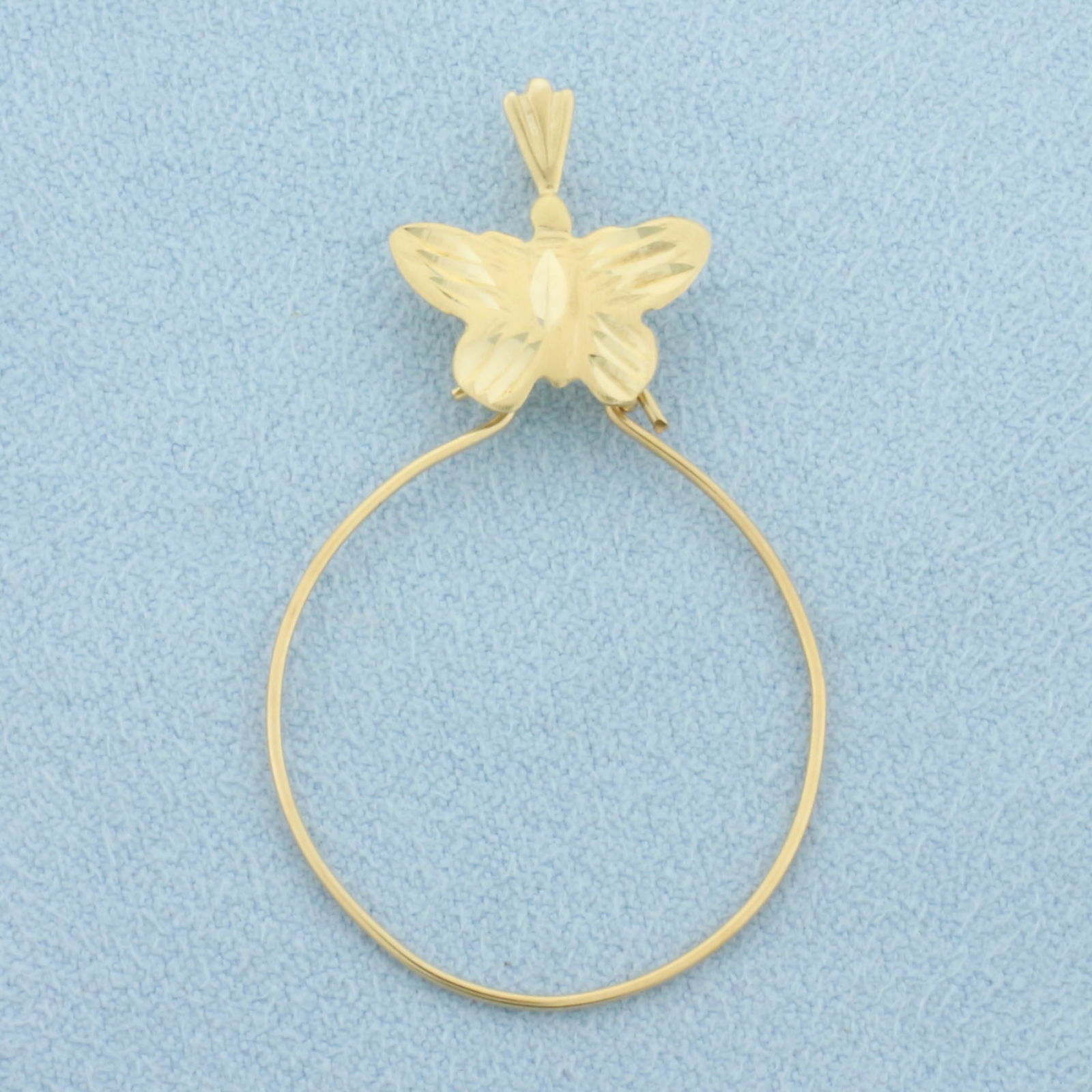 Butterfly Charm Holder Pendant in 14k Yellow Gold: In 14k Yellow Gold. 1 5/8 inch long (including bale). 1 inch wide. 1.3g.