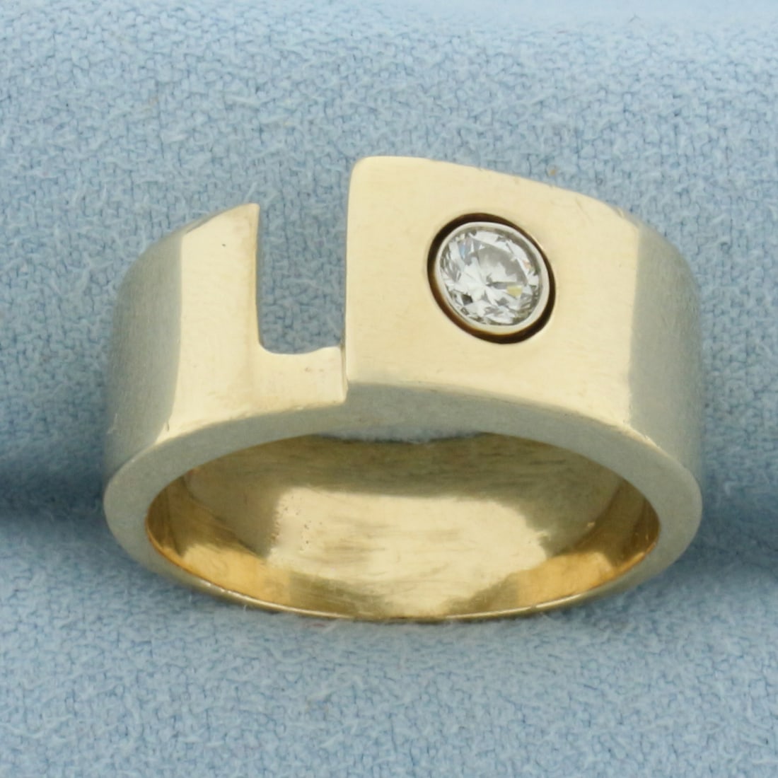 Unique Abstract Design Diamond Ring in 14k Yellow Gold: In 14k Yellow Gold. Contains one 1/4ct high quality diamond, VS clarity/H color. 8.8mm wide at widest. Size 8.75. 12.2g.