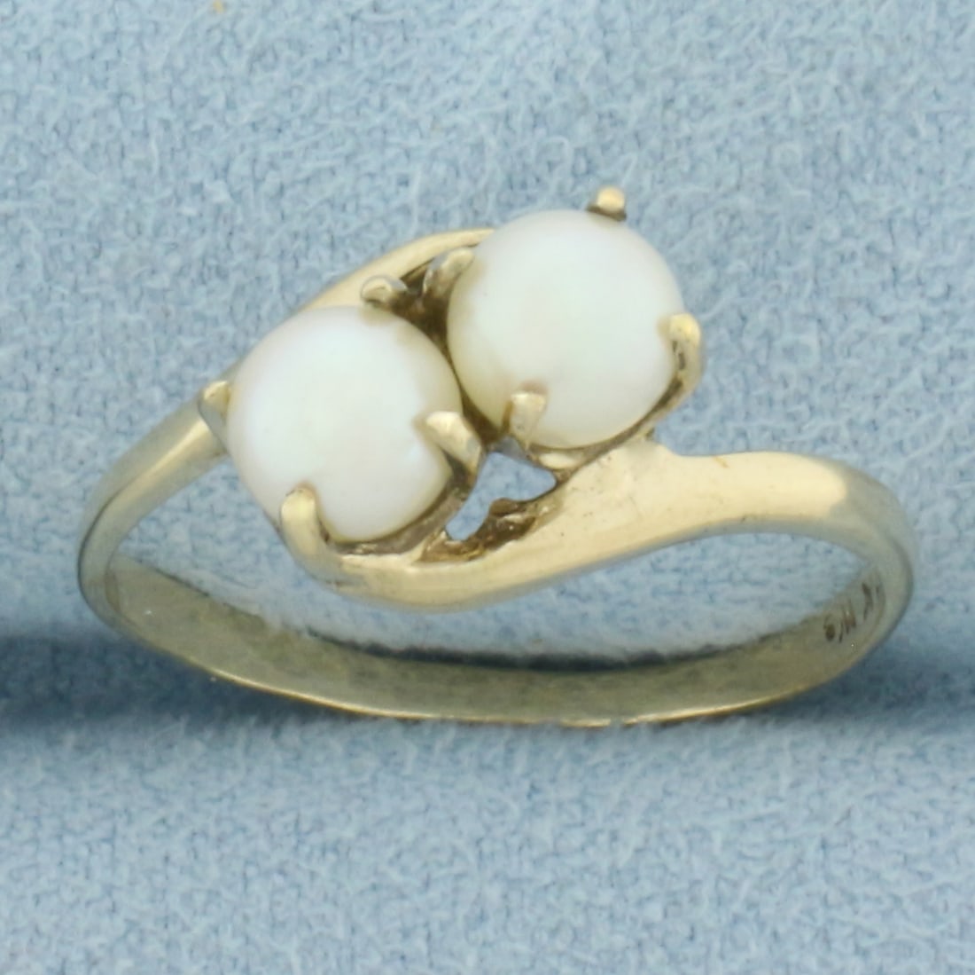Cultured Pearl Toi et Moi Ring in 10k Yellow Gold: In 10k Yellow Gold. Contains two 5.2mm high quality Cultured Pearls with high luster. Size 8. 2.0g.