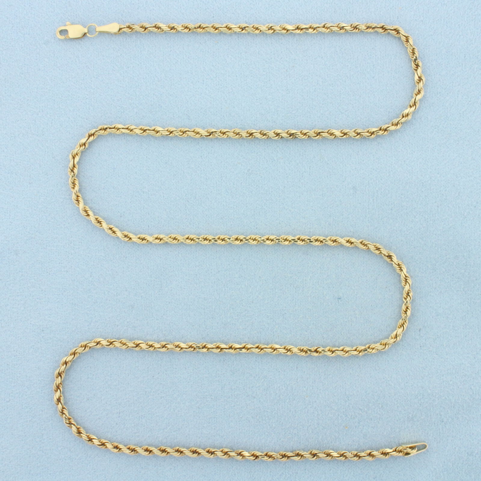 20 Inch Rope Link Chain Necklace in 14k Yellow Gold: In 14k Yellow Gold. 20 inches long. 2.3mm wide. Lobster clasp. 3.8g.