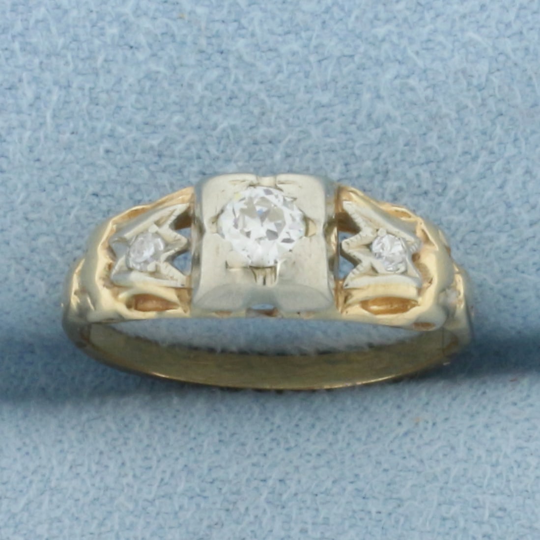 Antique Old European Cut Diamond Ring in 14k Yellow Gold: In 14k Yellow Gold. Contains one 1/4ct high quality Old European cut diamond, VS clarity/H color. Also contains two high quality .02ct diamonds of similar high quality. Size 4.5. 1.9g.