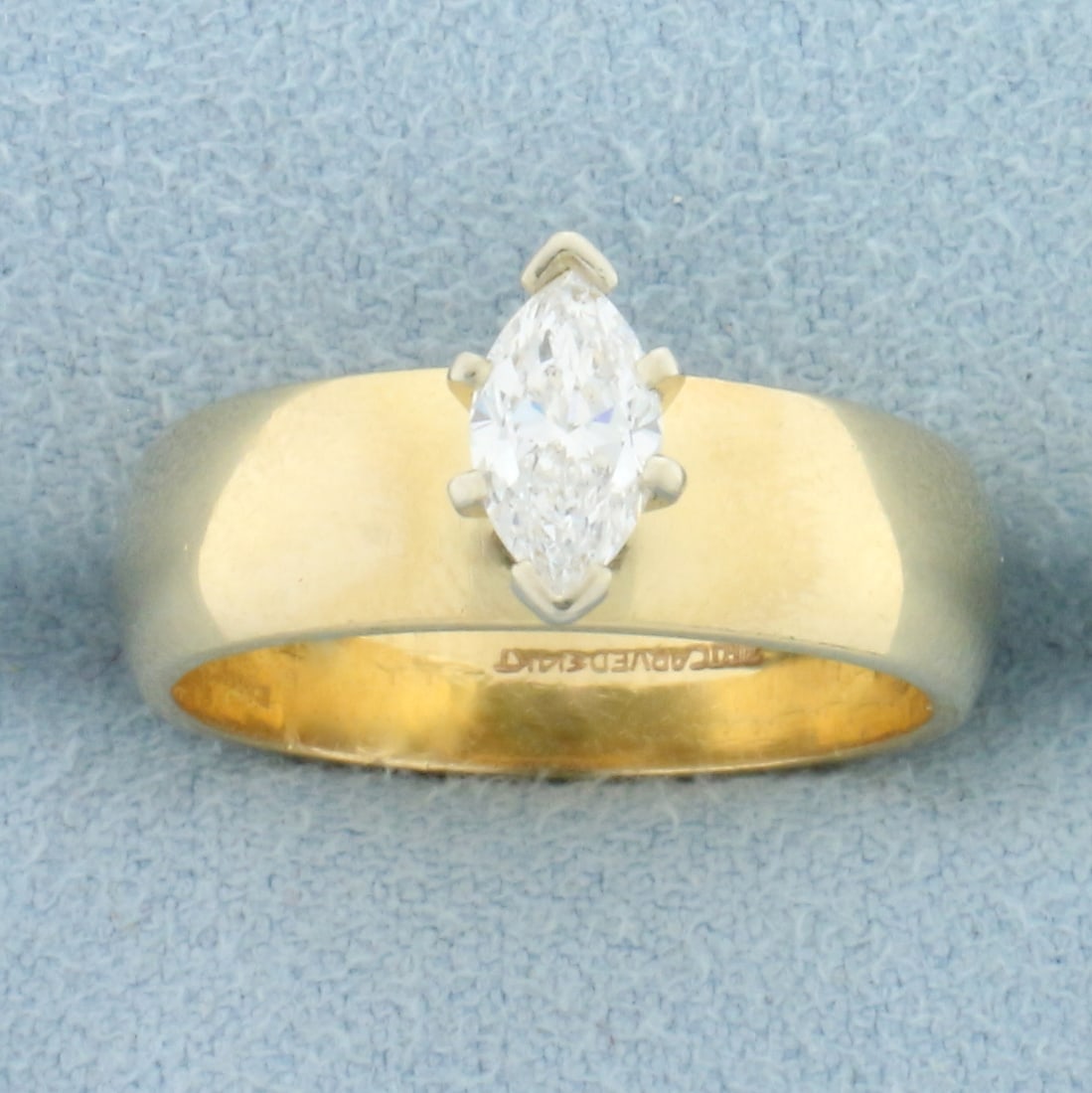 Vintage Marquise Diamond Solitaire Wide Band Engagement Ring in 14k Yellow Gold: In 14k yellow gold. Contains one high quality 1/2ct marquise diamond, SI1 clarity/F color, completely eye clean and great cut for lots of sparkle. Size 7. 6.3g.