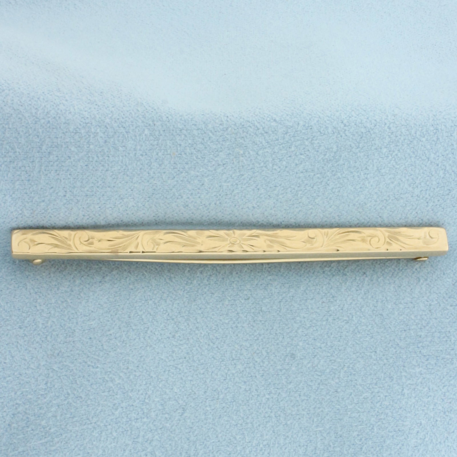 Vintage Floral Design Engraved Bar Pin in 10k Yellow Gold: In 10k Yellow Gold. 2 3/8 inches long. 4mm wide. 2.7g.