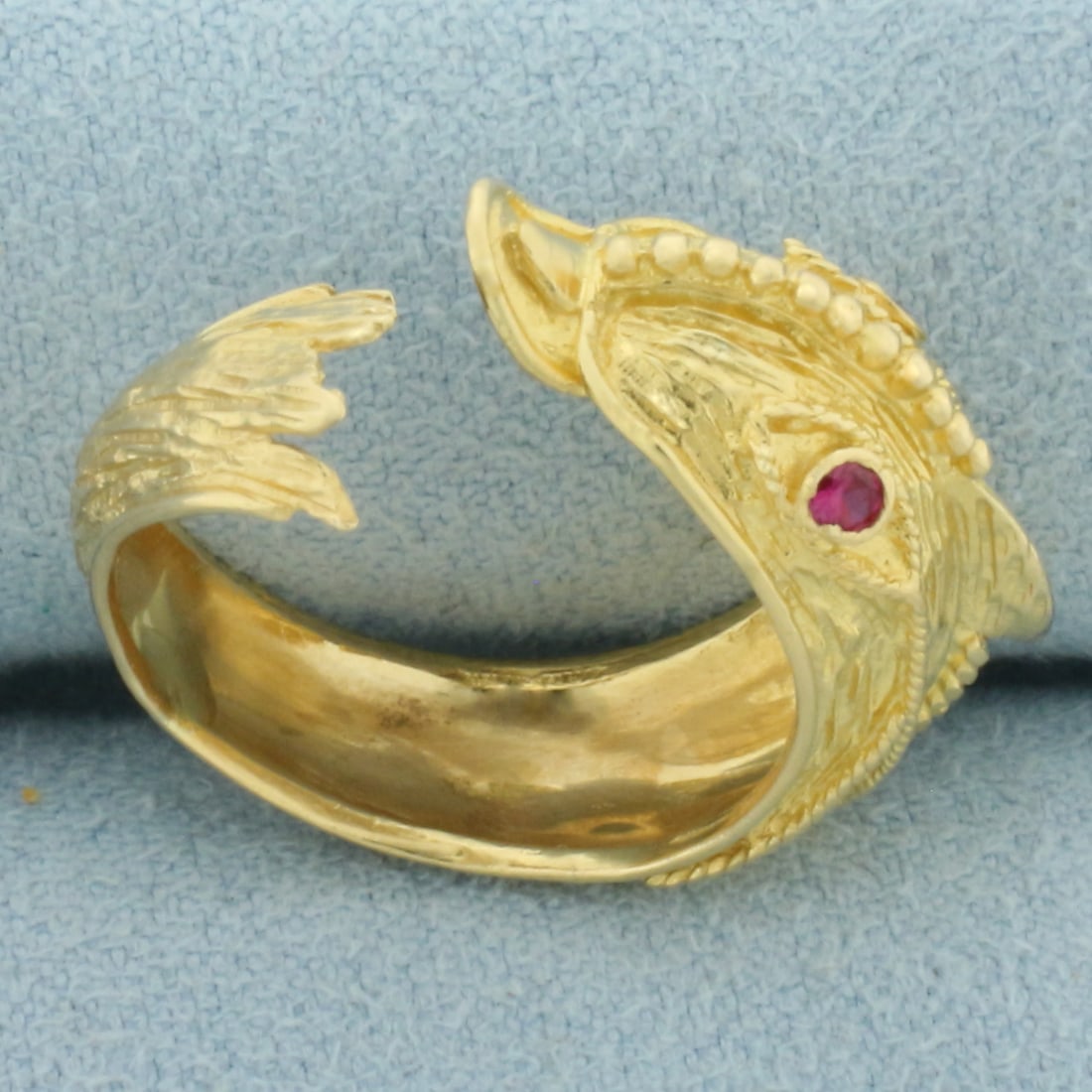 Adjustable Dolphin Ring in 18k Yellow Gold: In 18k Yellow Gold. Contains two 2mm high quality natural Ruby gemstones with vibrant color. 10mm wide at widest. Size 6.5 (adjustable). 4.3g.
