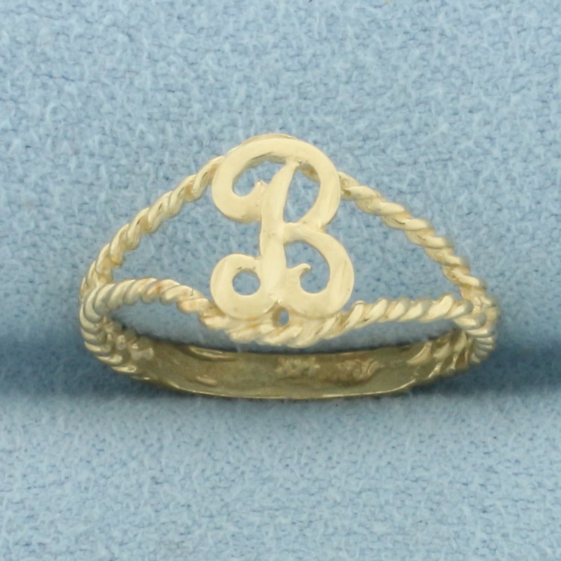 B Initial Ring in 14k Yellow Gold: In 14k Yellow Gold. 9.3mm wide at top. Size 6. 1.3g.