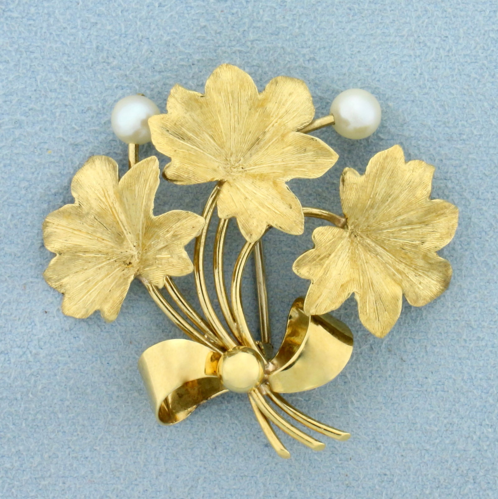 Vintage Italian Flower Pearl Pin in 18K Yellow Gold: In 18K Yellow Gold. Contains two high quality natural 5mm Cultured Akoya Pearls, with high luster. 1 1/2 inches long and wide. 10.1g