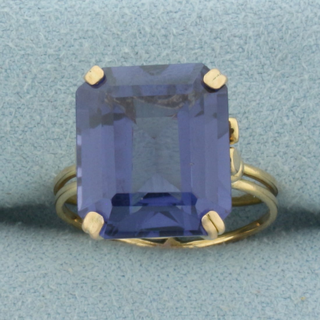 Color Changing Lab Alexandrite Solitaire Ring in 18k Yellow Gold: In 18k Yellow Gold. Contains one 14x12mm high quality color changing Lab Alexandrite gemstone, approximately 11cts, with dramatic blue to pink color shift. Size 7. 5.1g.