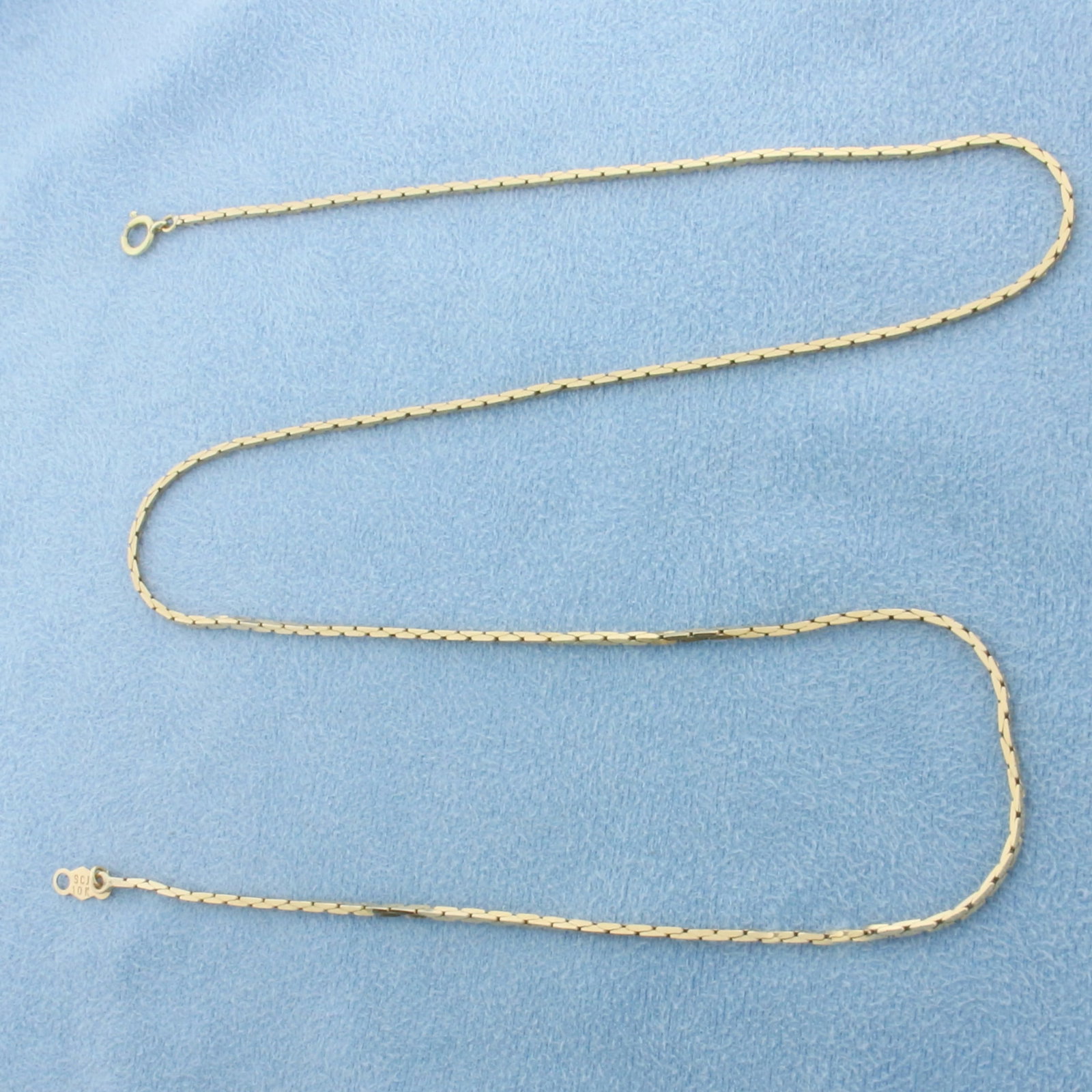 18 Inch Boston Link Chain Necklace in 10k Yellow Gold: In 10k Yellow Gold. 18 inches long. 1mm wide. Spring clasp. 3.9g.