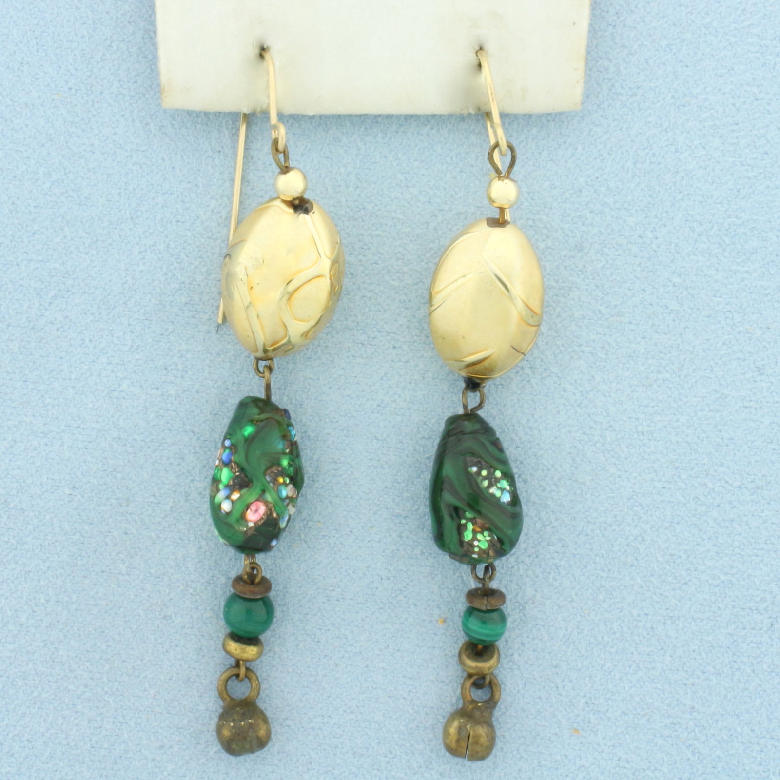 Art Glass Beaded Dangle Earrings in 14k Yellow Gold: In 14k Yellow Gold. 2 3/4 inch long. 3/8 inch wide. Hook backs. 7.3g.