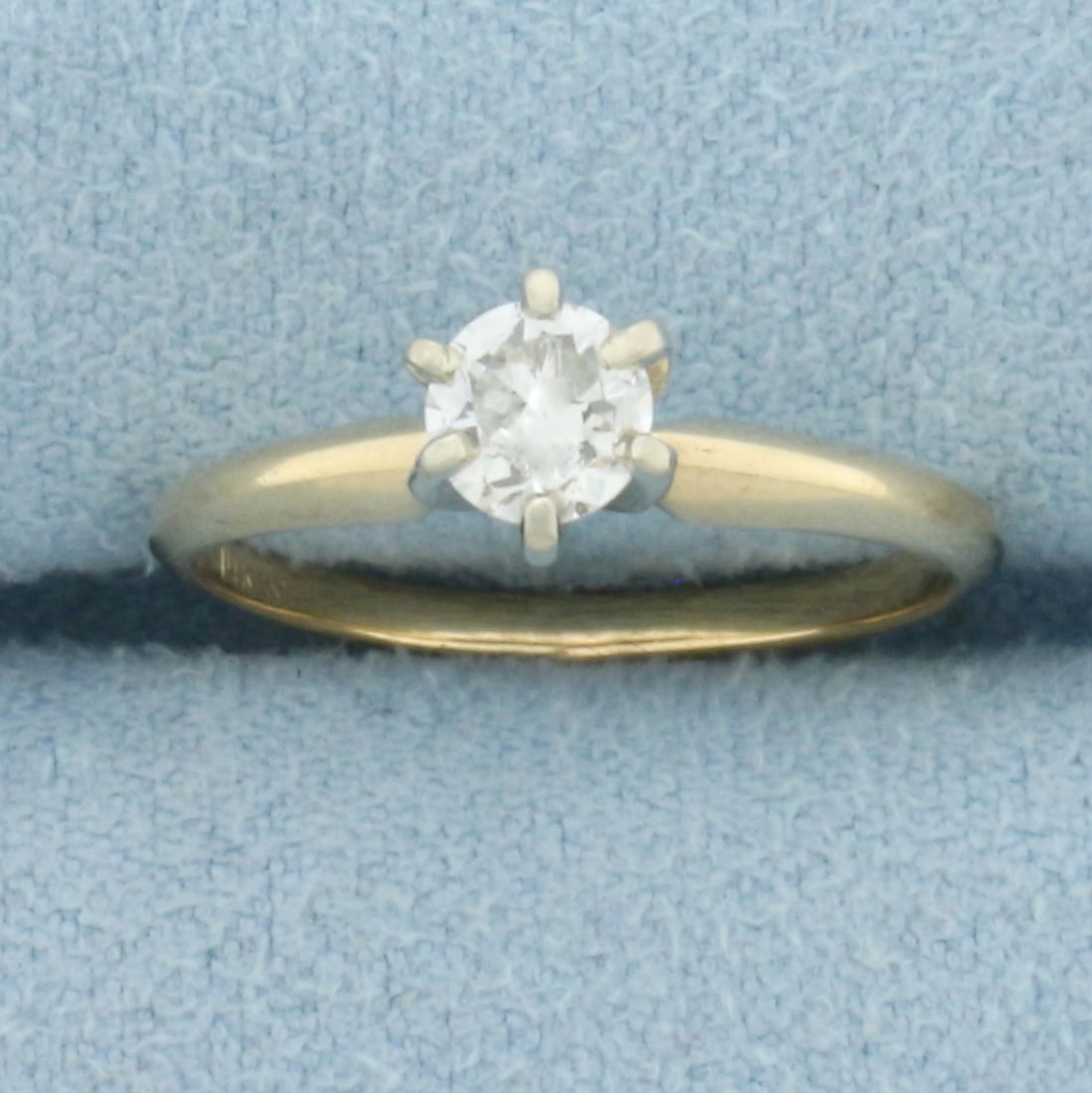 Diamond Solitaire Engagement or Promise Ring in 14k Yellow Gold: In 14k Yellow Gold. Contains one 1/3ct high quality round brilliant diamond, SI clarity/H color, great cut for added brilliance, eye clean. Size 5.5. 1.9g.