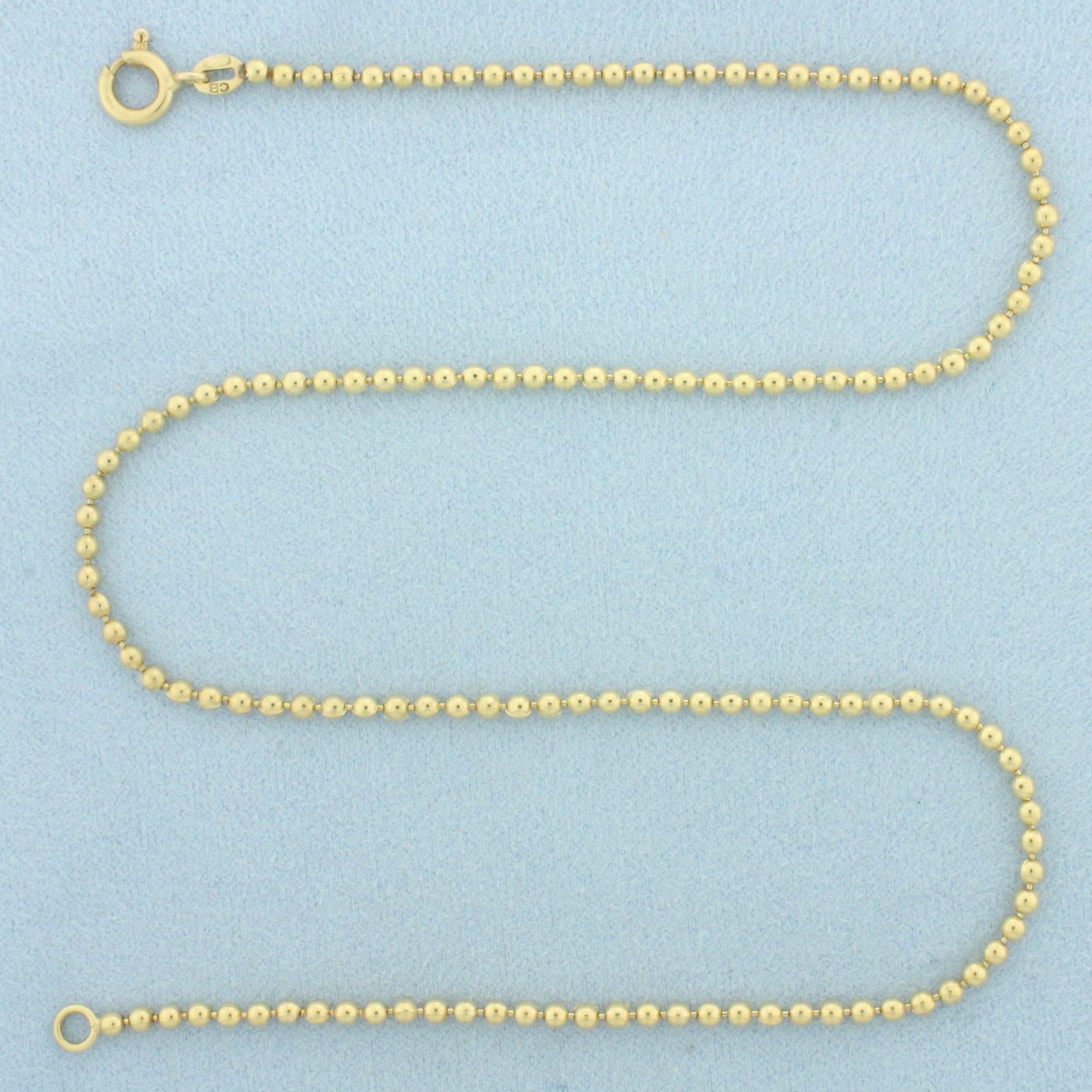 15 Inch Ball Bead Choker Necklace in 18k Yellow Gold: In 18k Yellow Gold. 15 inches long. 2.2mm wide. Spring clasp. 10.7g.
